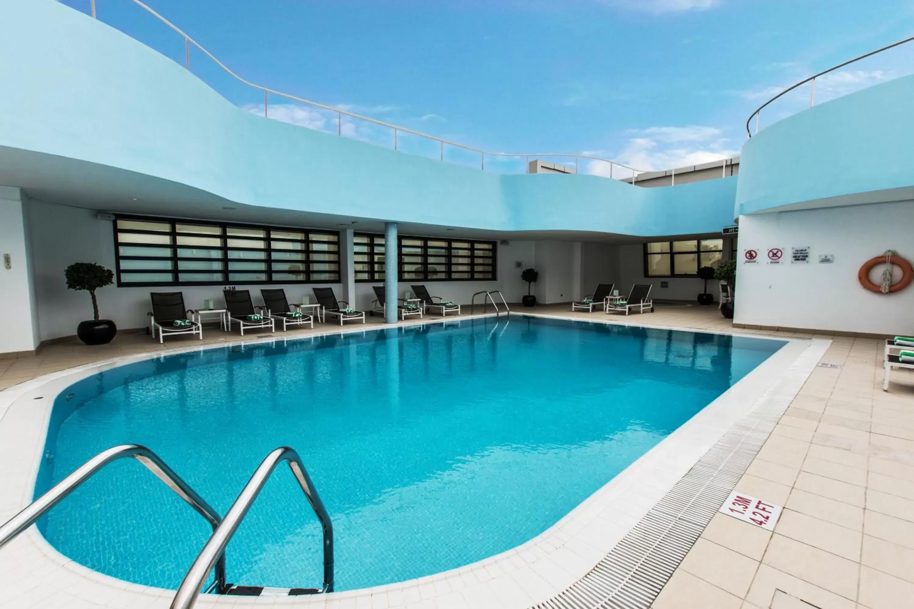 Swimming Pool in Holiday Inn Abu Dhabi, an IHG Hotel