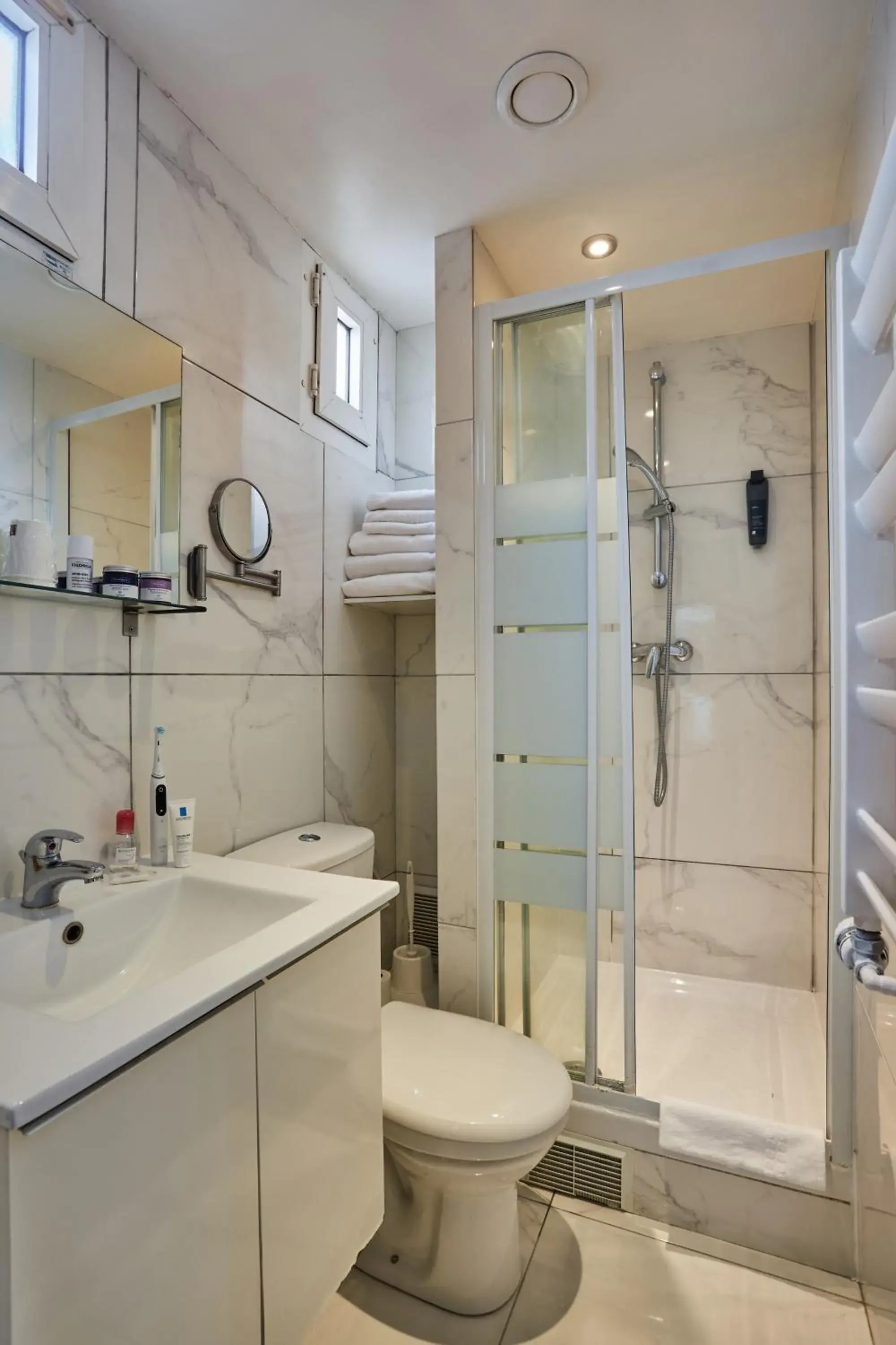 Shower, Bathroom in Hipotel Paris Buttes Chaumont
