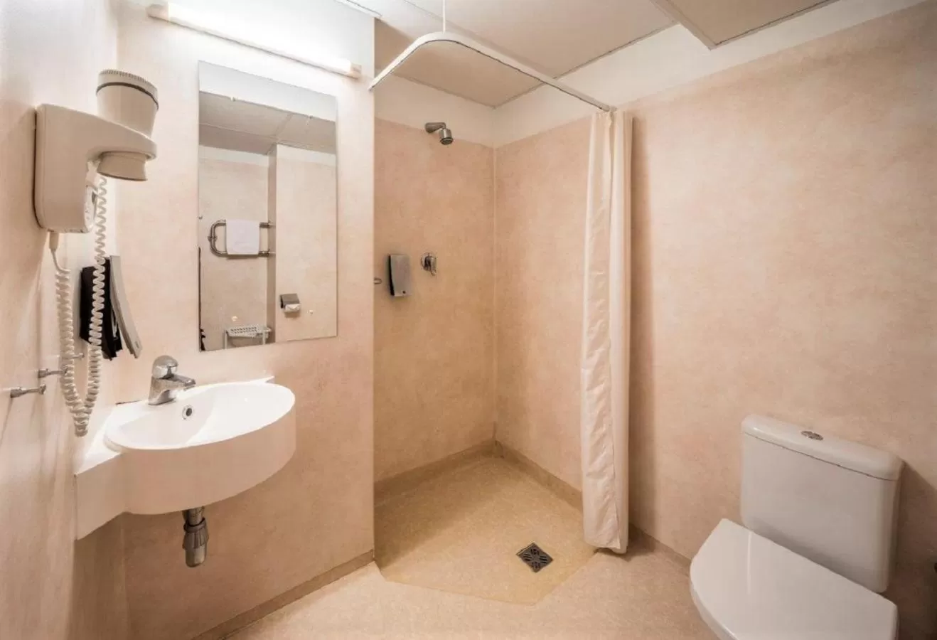 Bathroom in Rija Bauska Hotel