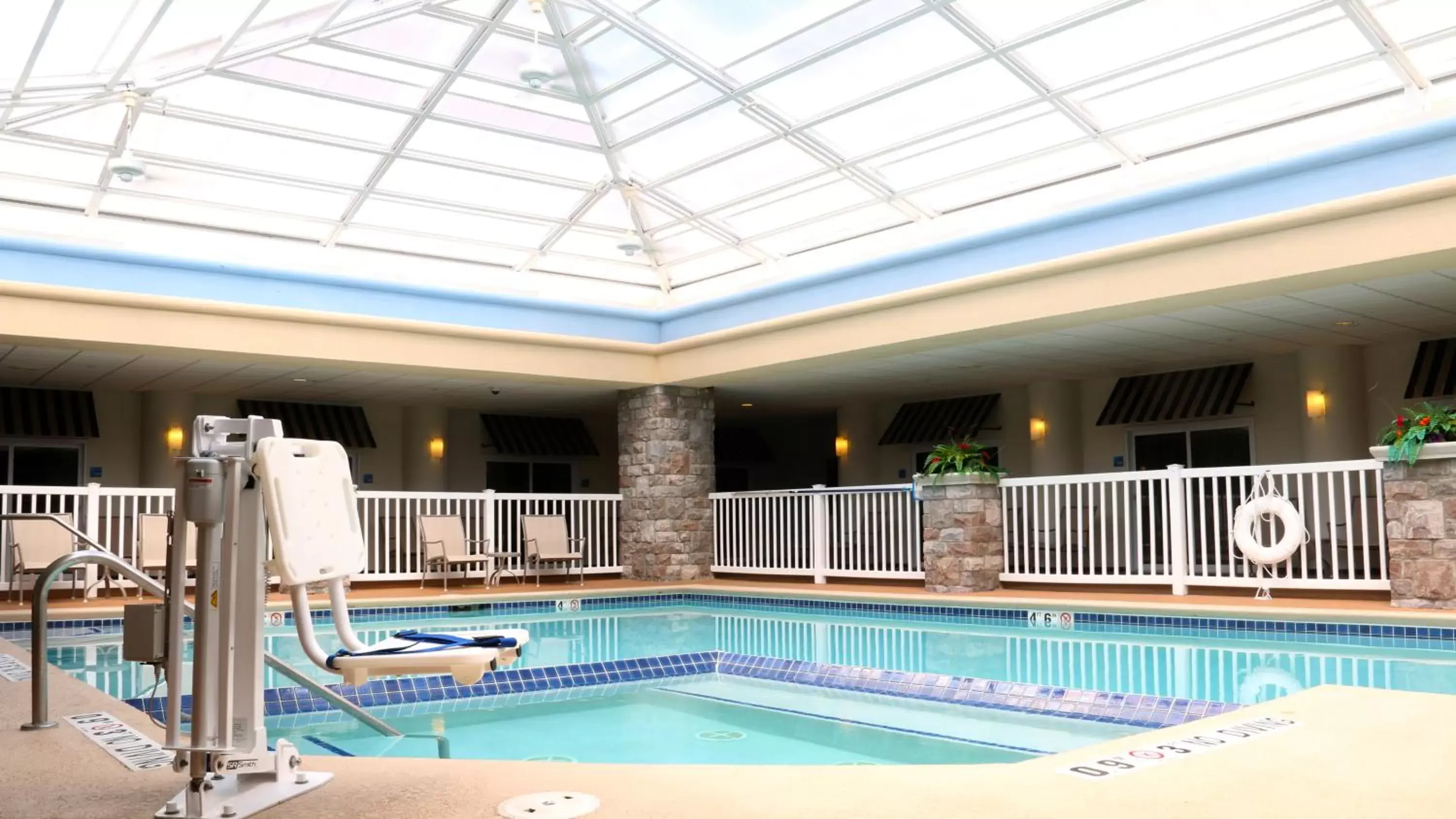 Swimming pool in Holiday Inn Express Hotel & Suites Saginaw, an IHG Hotel