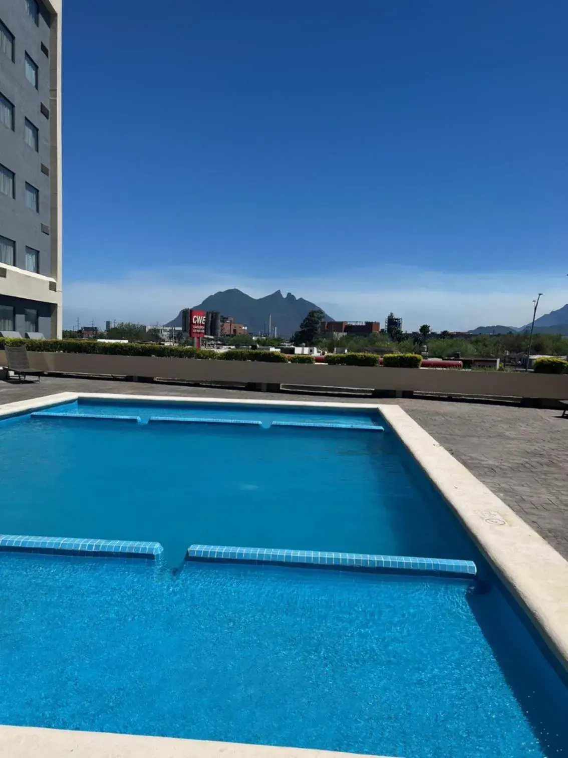 Swimming Pool in CHN Hotel Monterrey Norte, Trademark Collection by Wyndham