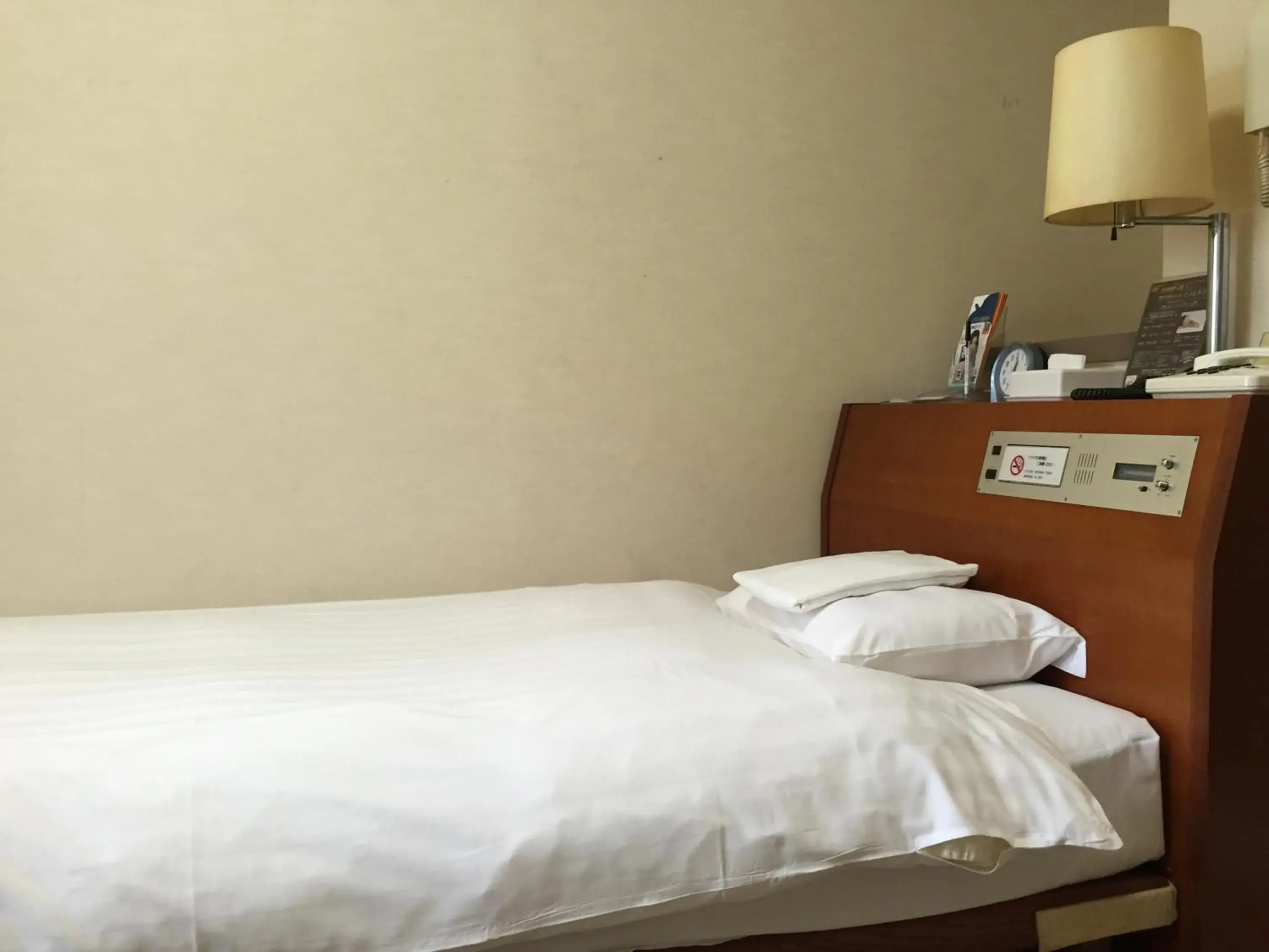 Bed in SkyHeart Hotel Kawasaki