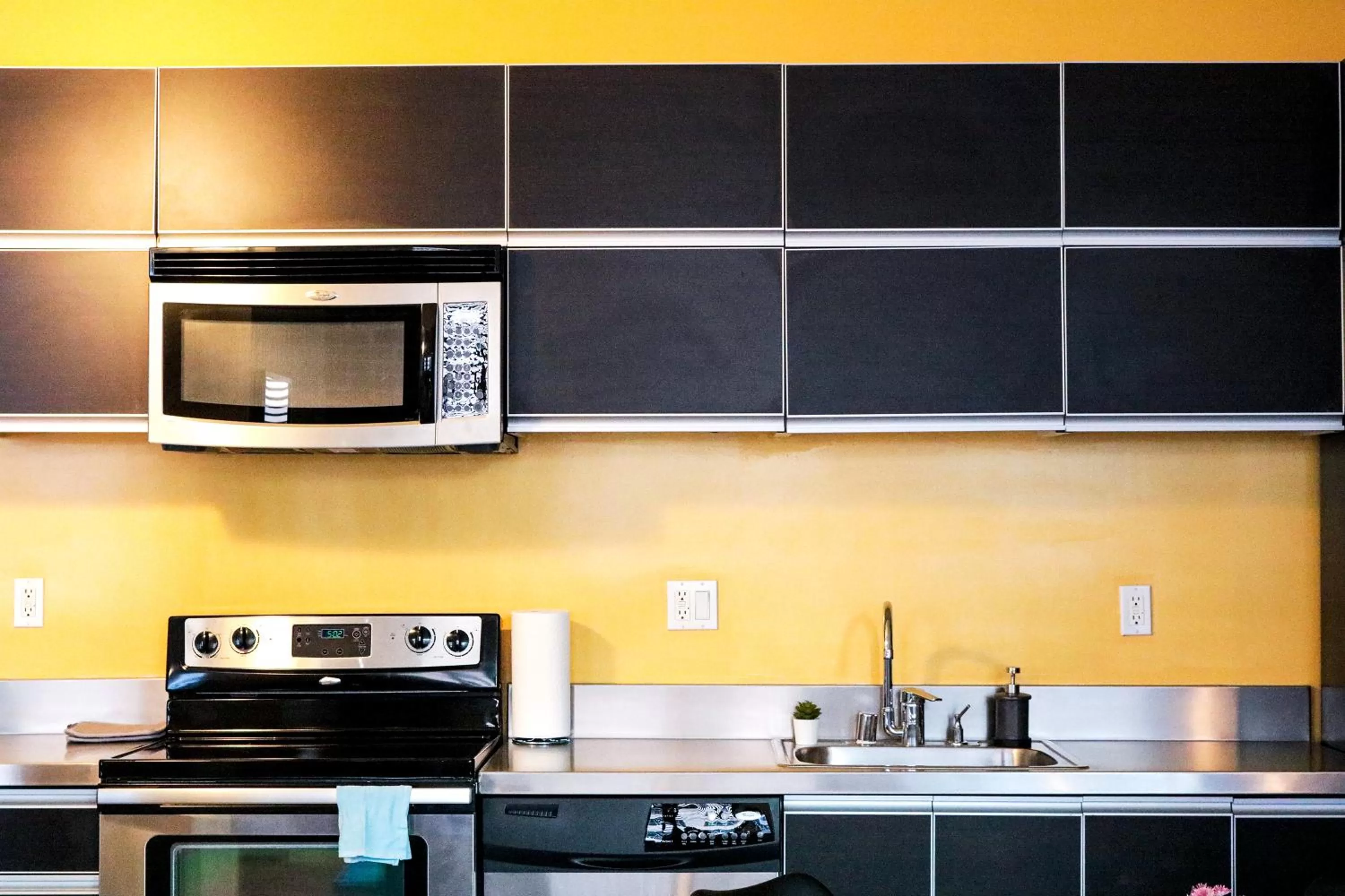 Kitchen/Kitchenette in The Haas Suites