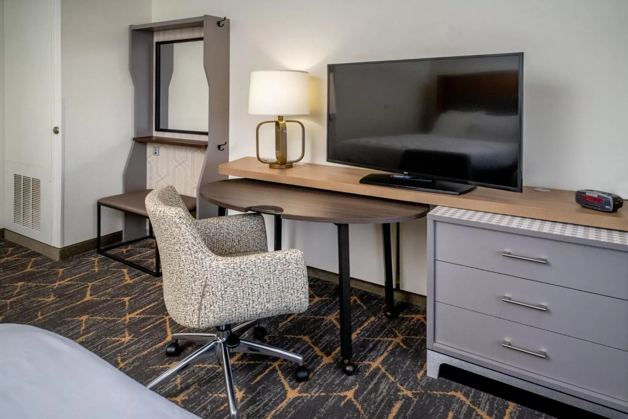 Photo of the whole room, TV/Entertainment Center in Holiday Inn Hotel & Suites Beckley, an IHG Hotel