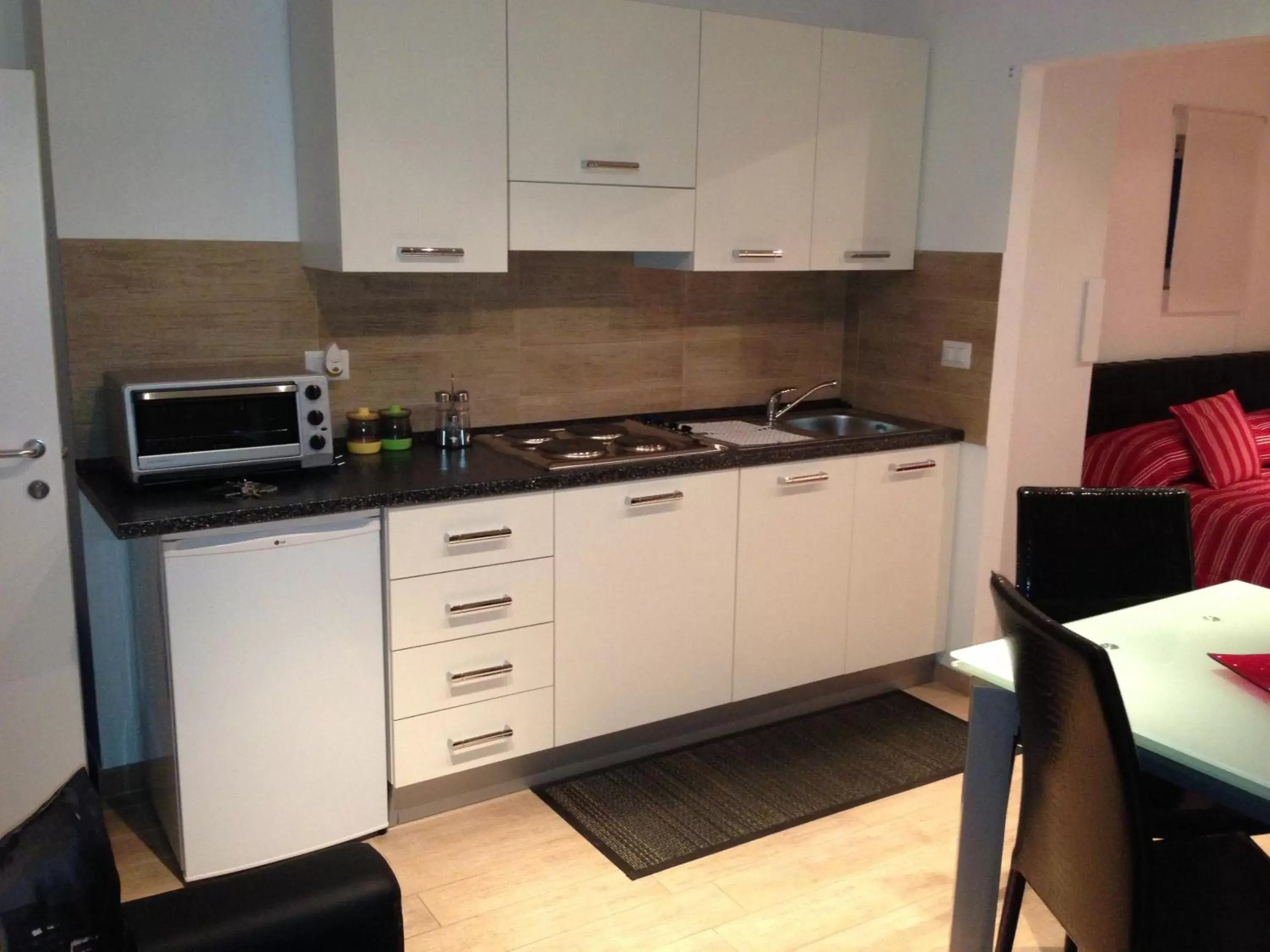 Dining area, Kitchen/Kitchenette in Albergo Diffuso Dimora Rossi