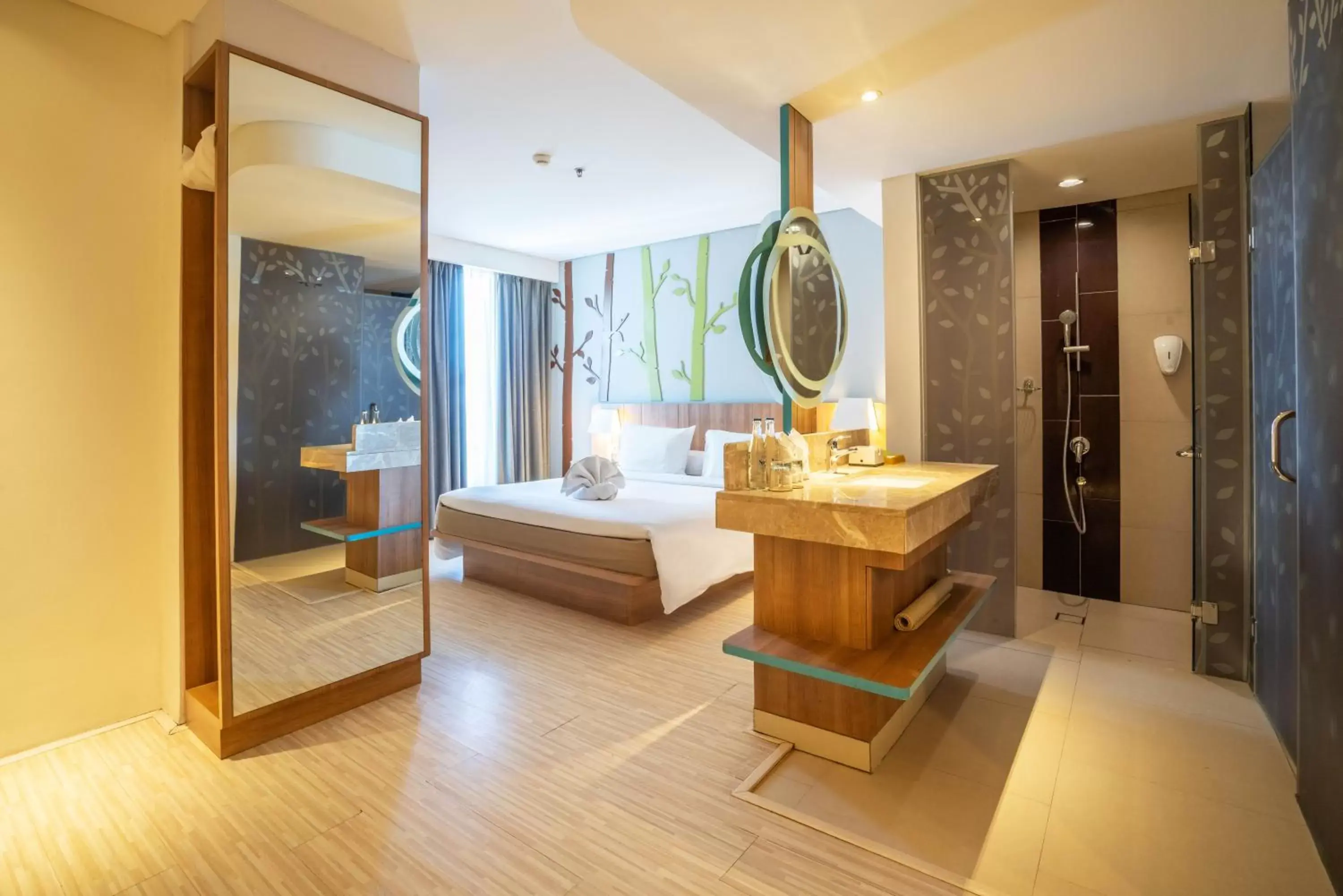 Bedroom, Bathroom in Grand Livio Kuta Hotel