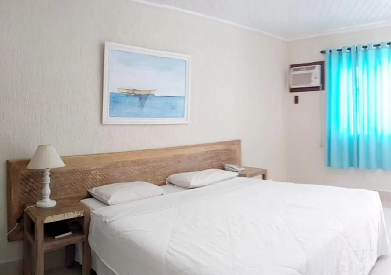 Bed in Hotel Don Quijote Búzios