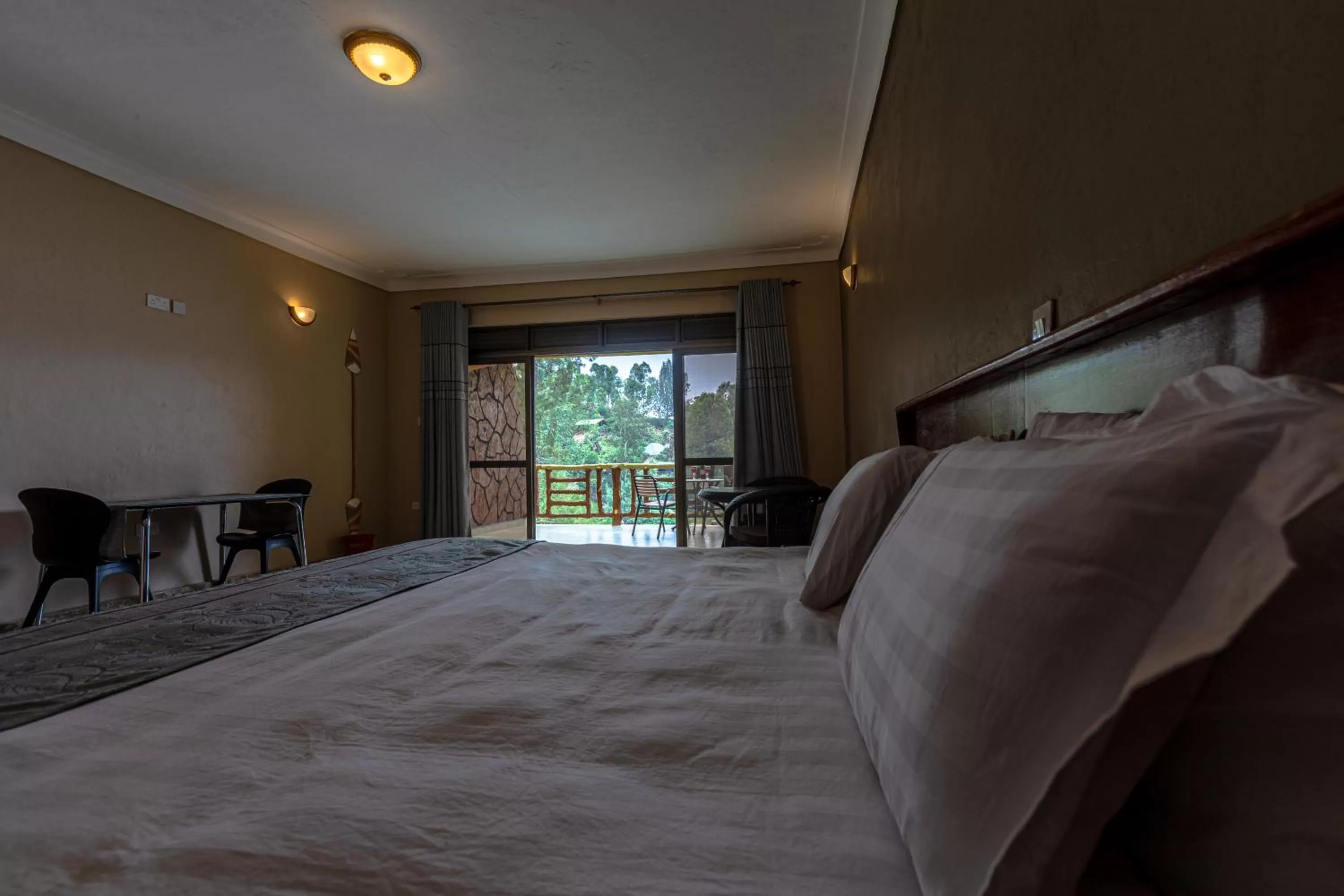 Bed in Bunyonyi Overland Resort