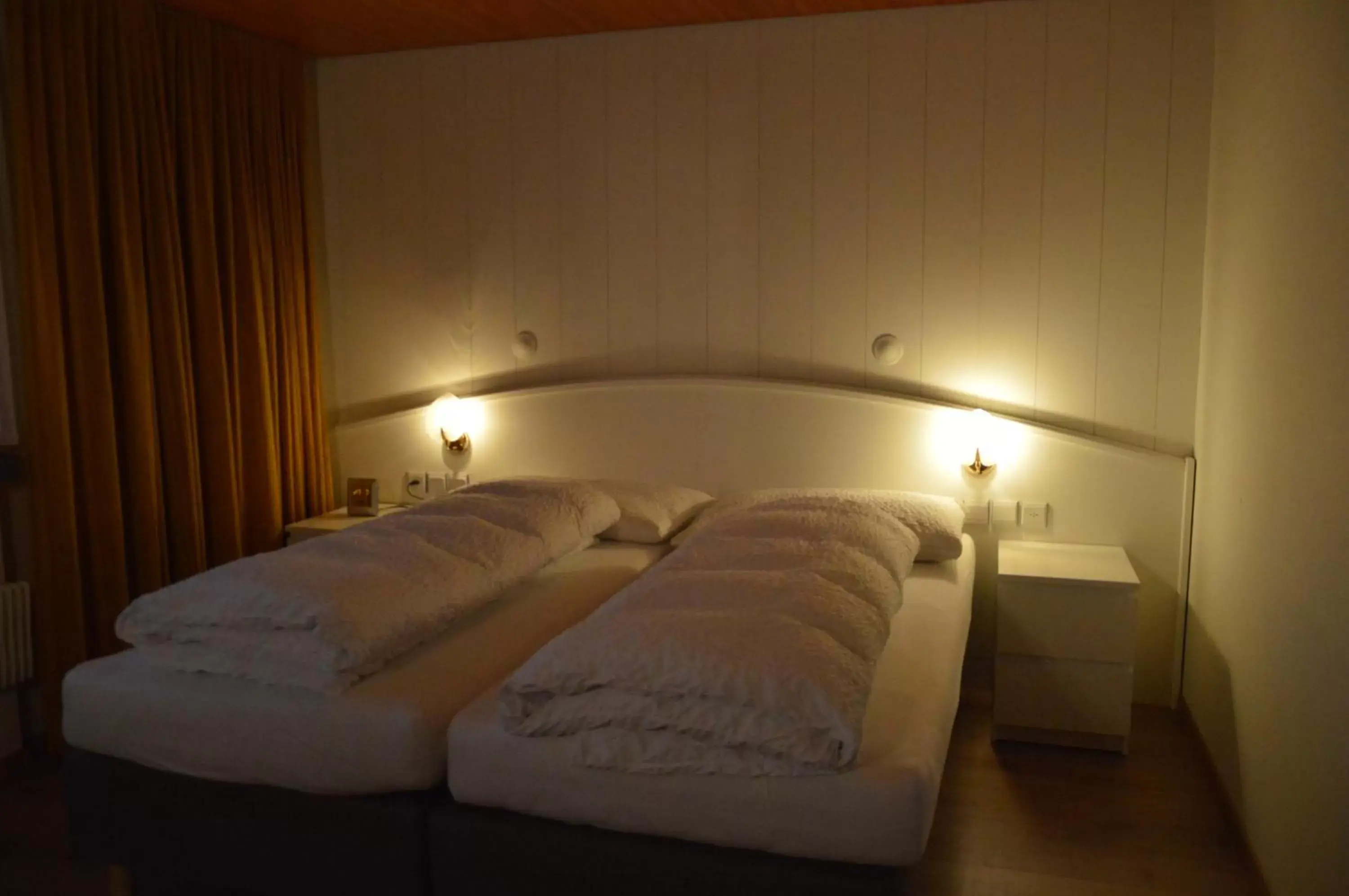 Bed in Hotel Garni Rösslipost