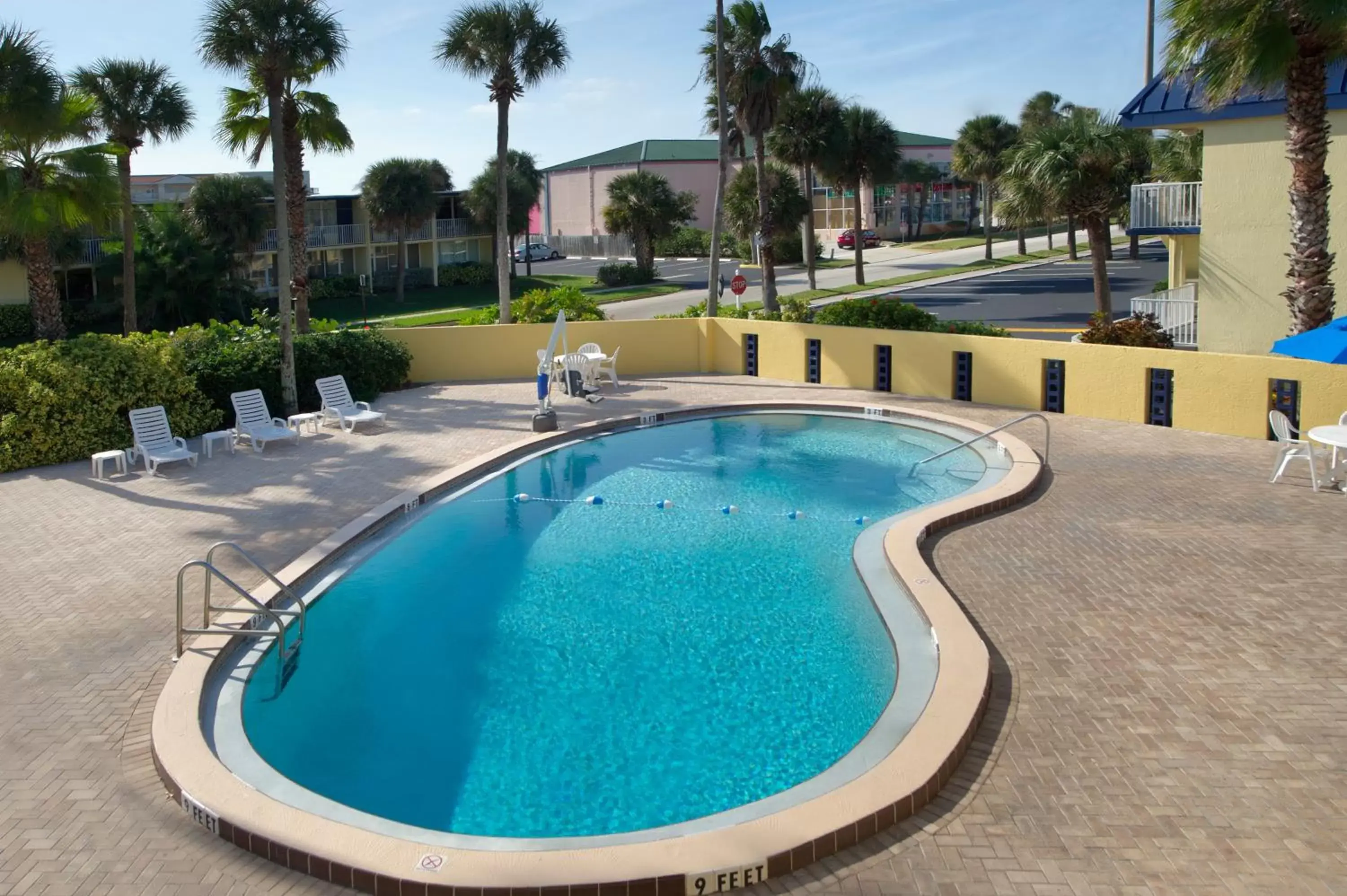Day, Swimming Pool in Days Inn by Wyndham Cocoa Beach Port Canaveral