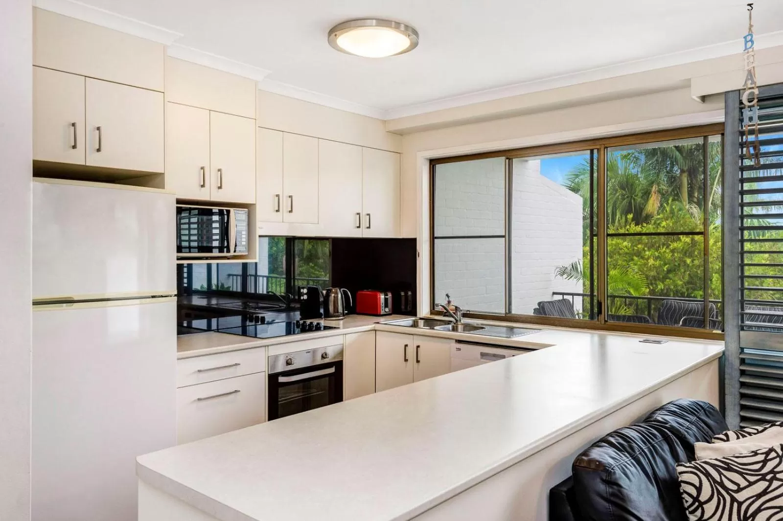 kitchen in The Oasis Apartments and Treetop Houses