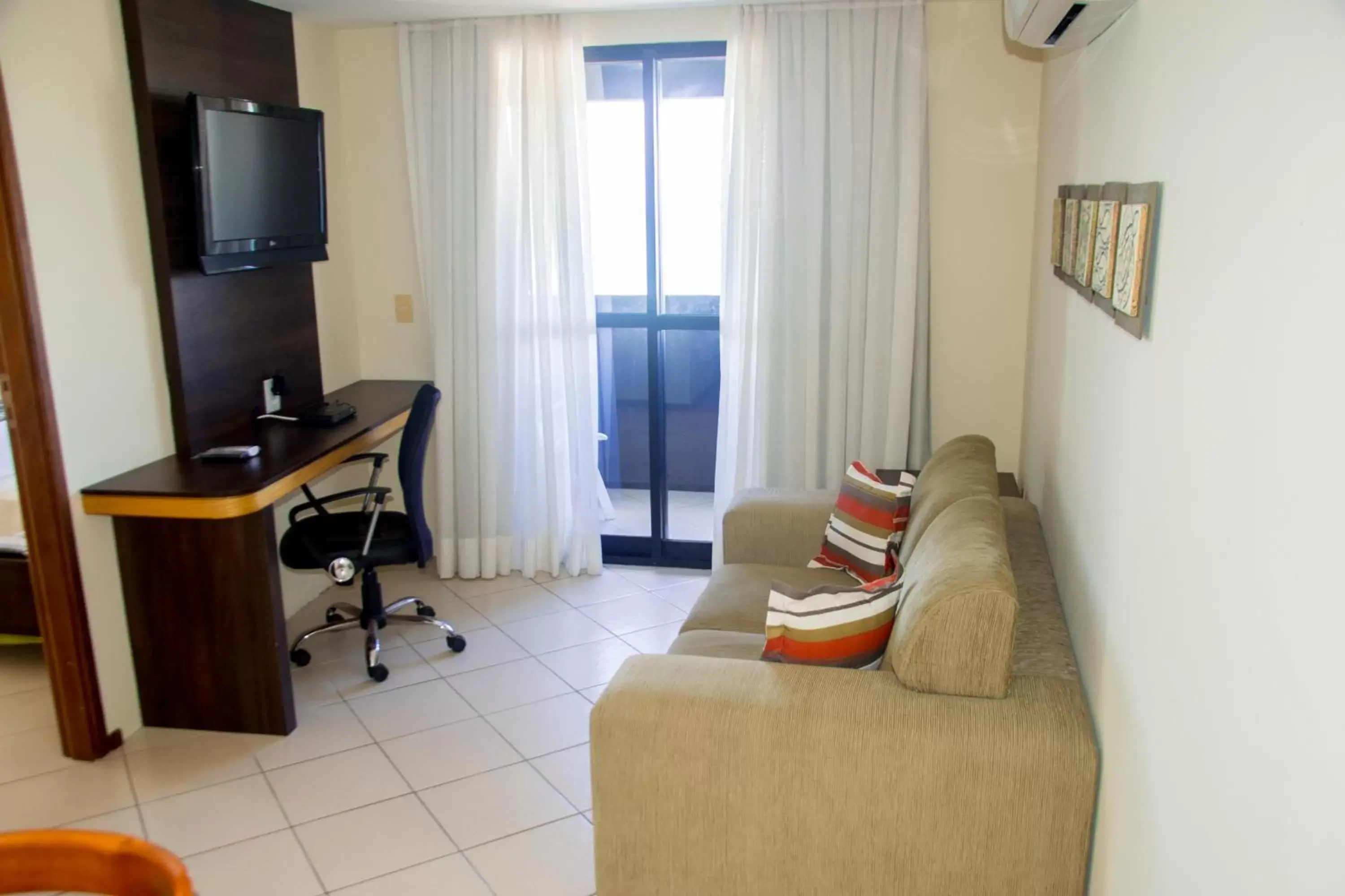 Living room, Seating Area in Quality Suites Natal