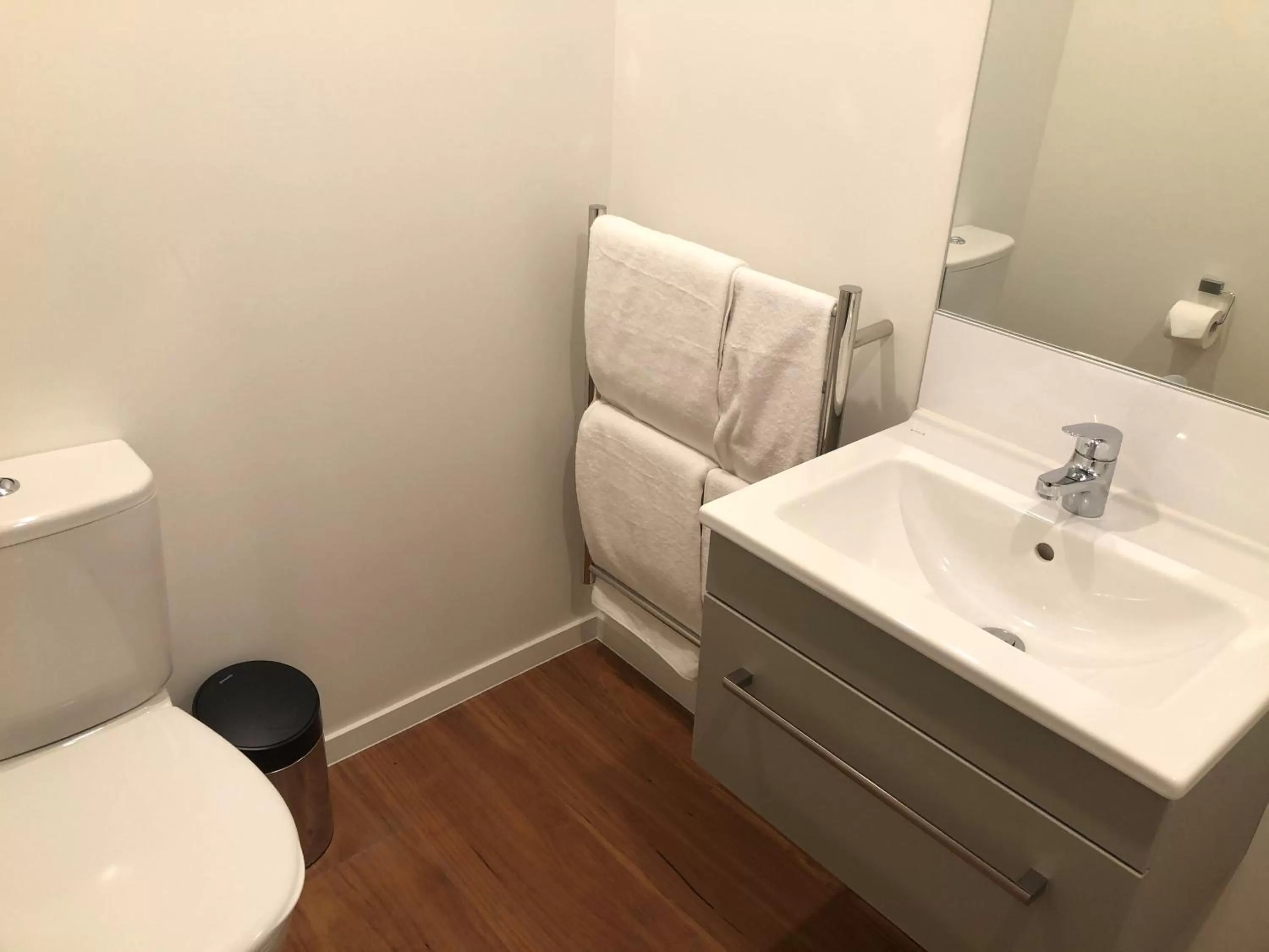 Bathroom in Ramada Suites by Wyndham Auckland Manukau Pacfic Centre