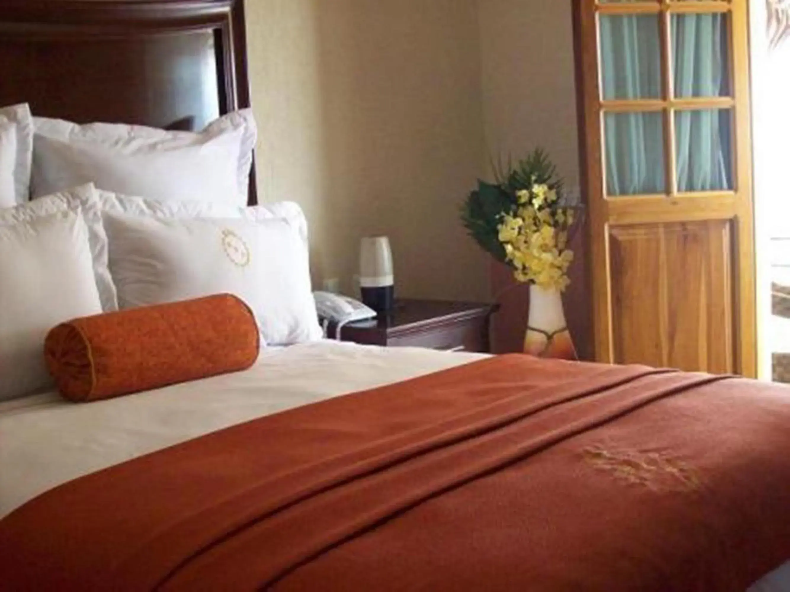 Bed in Hacienda Real del Caribe Hotel