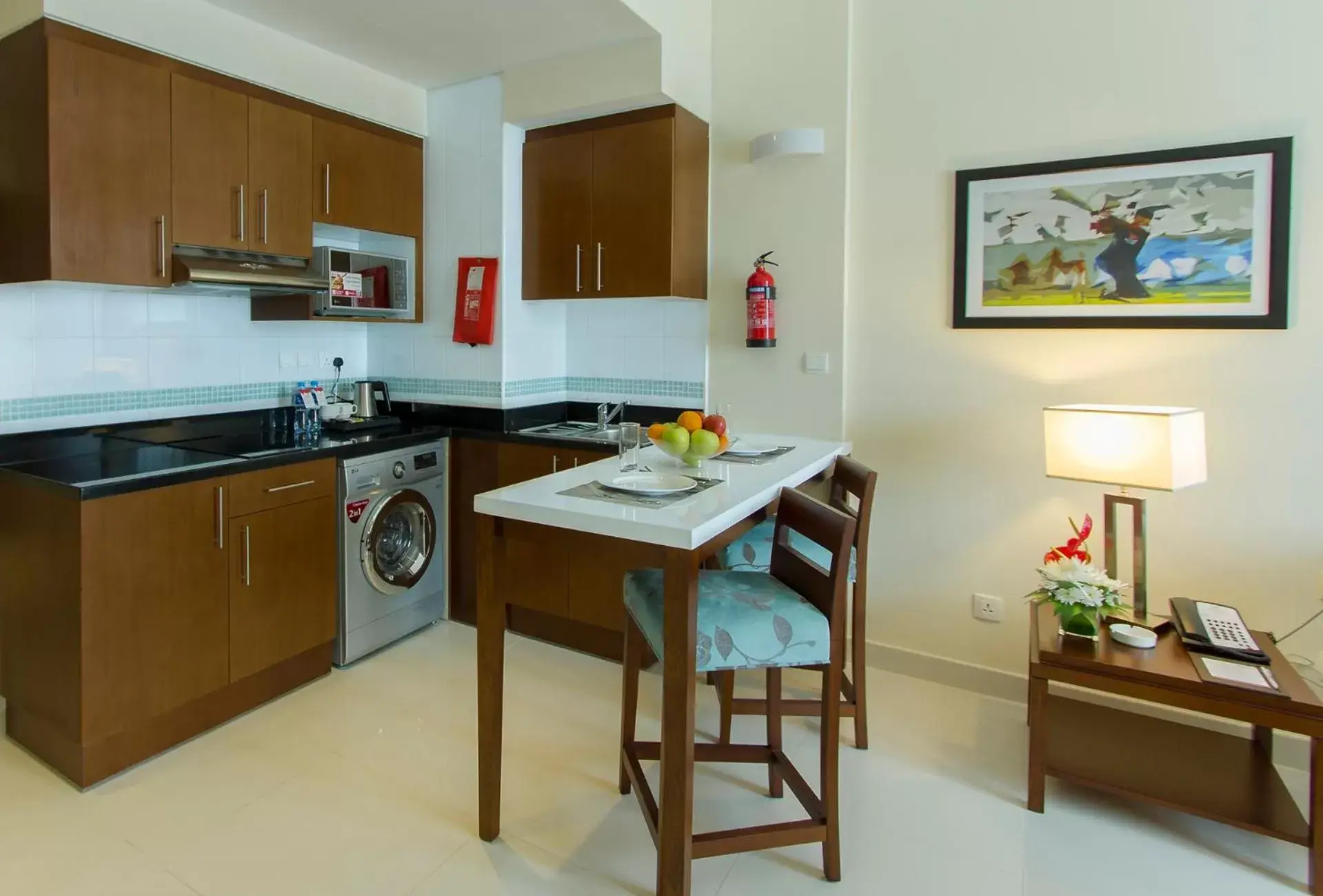 Kitchen or kitchenette, Kitchen/Kitchenette in Treppan Hotel & Suites By Fakhruddin
