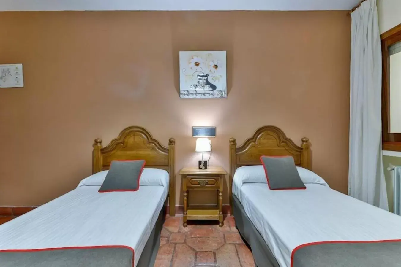 Bed in Hostal Alfonso XI