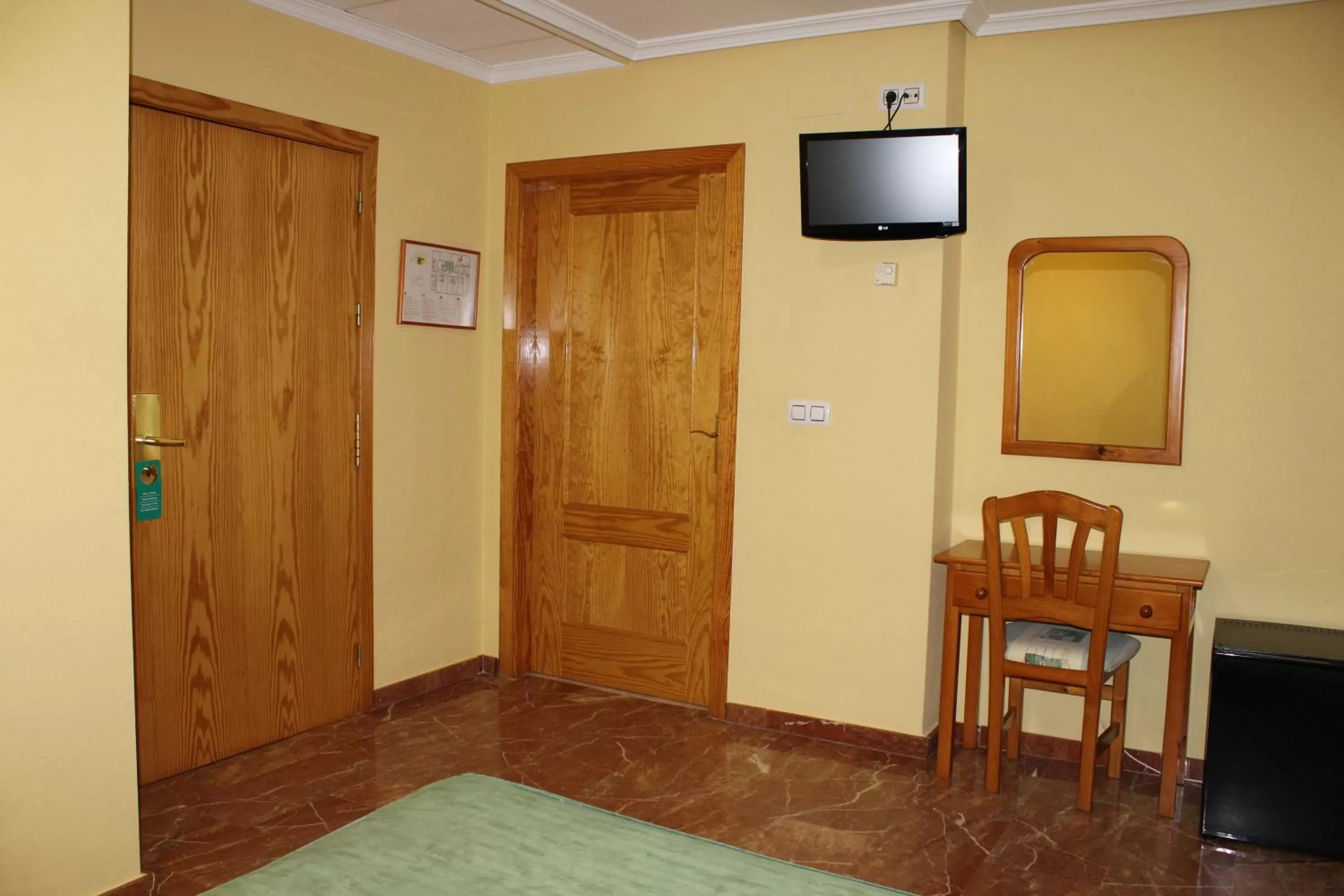 TV and multimedia, TV/Entertainment Center in Hotel Albohera