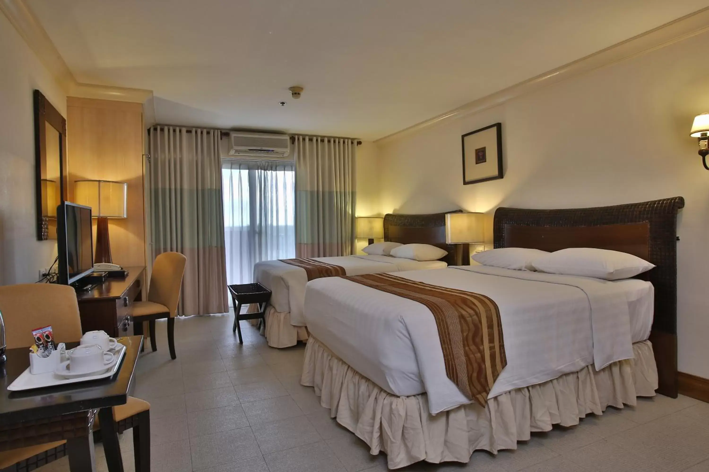 Bed in Crown Regency Suites Mactan Bed in Crown Regency Suites Mactan
