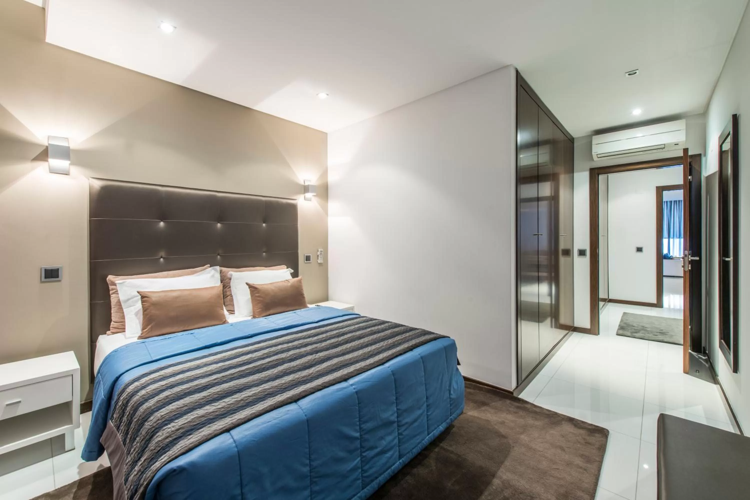 Bed in RK Suite Hotel