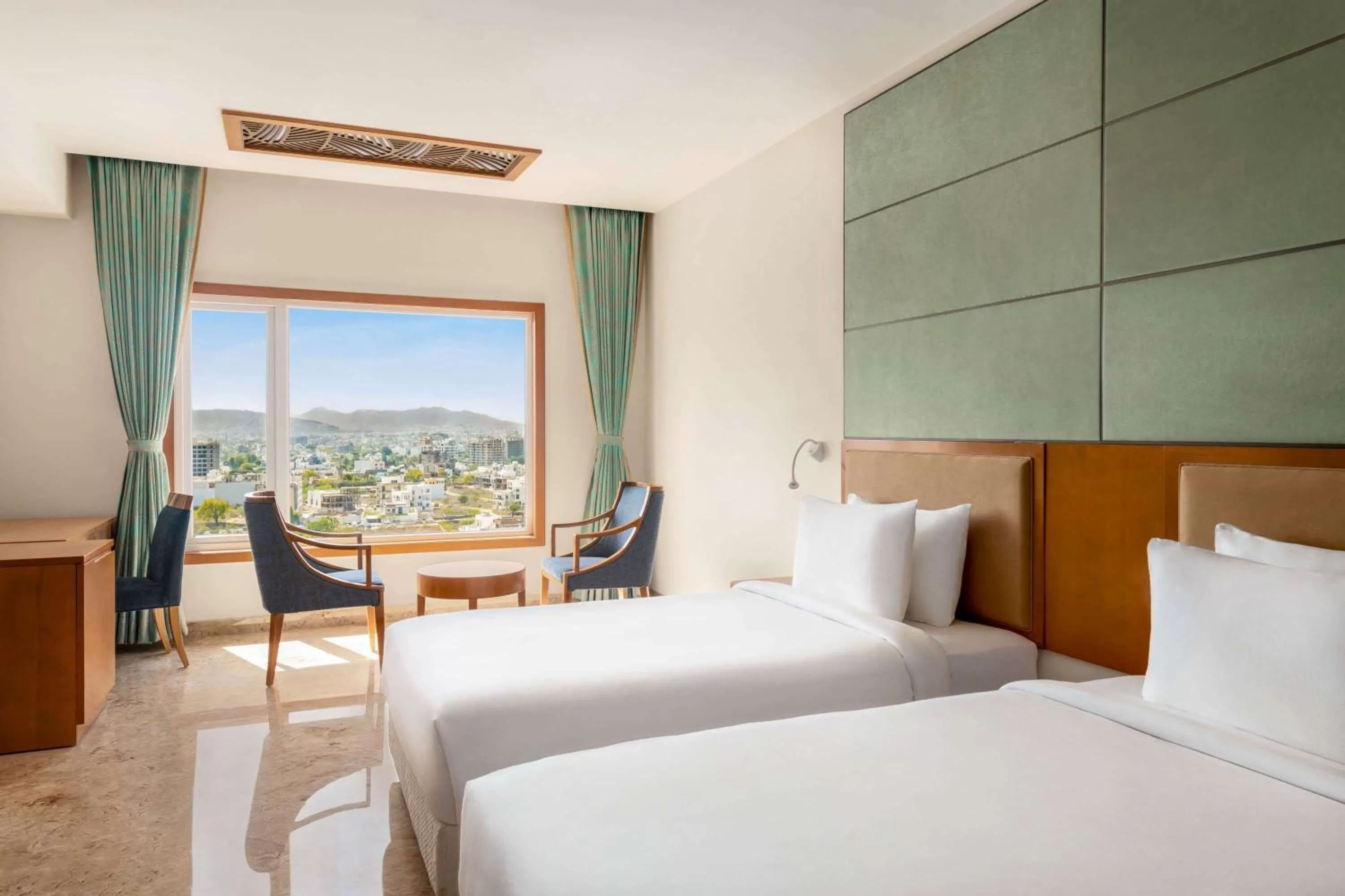 Photo of the whole room, Bed in Howard Johnson by Wyndham Udaipur Roop Nagar