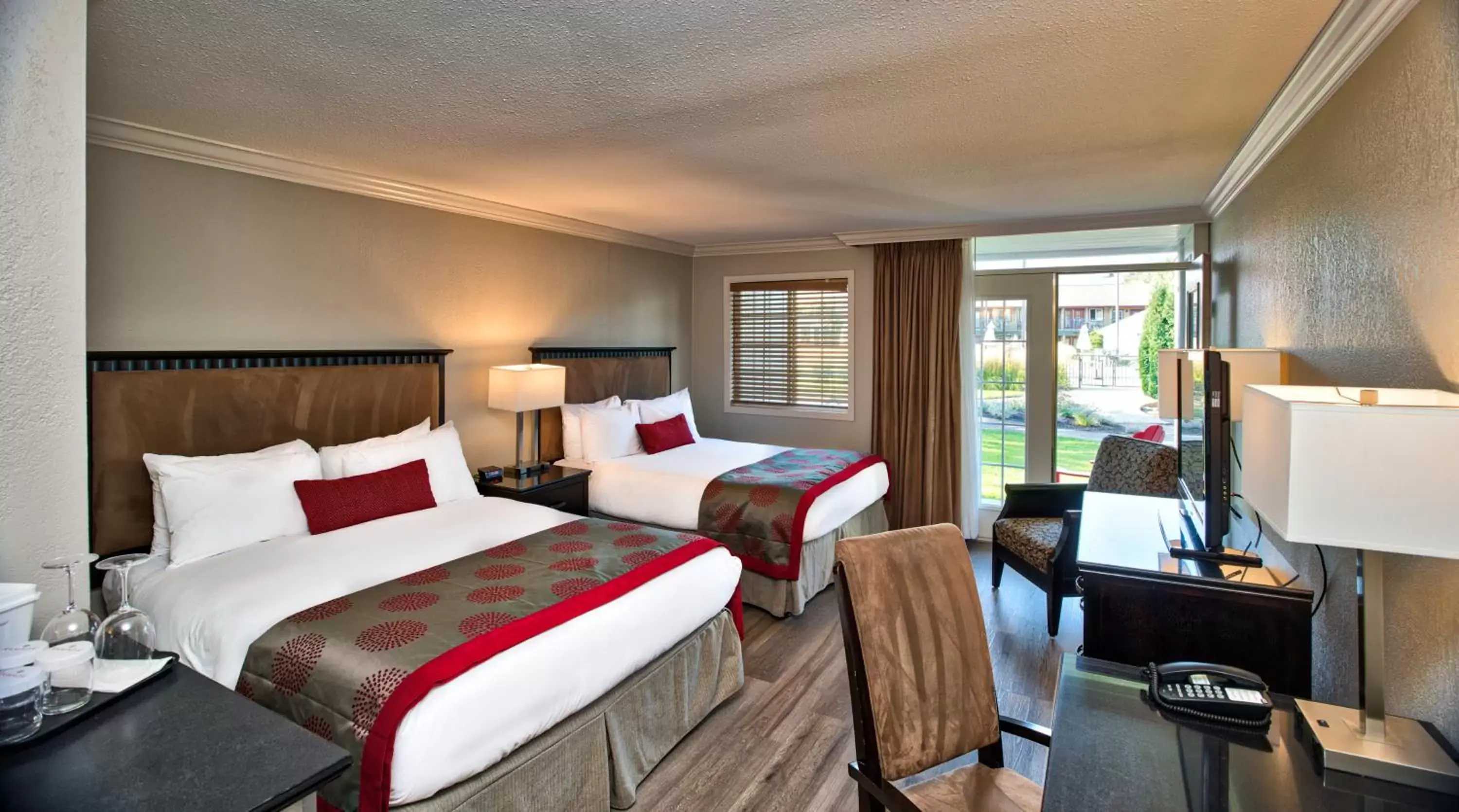 Bed in Ramada by Wyndham Penticton Hotel & Suites