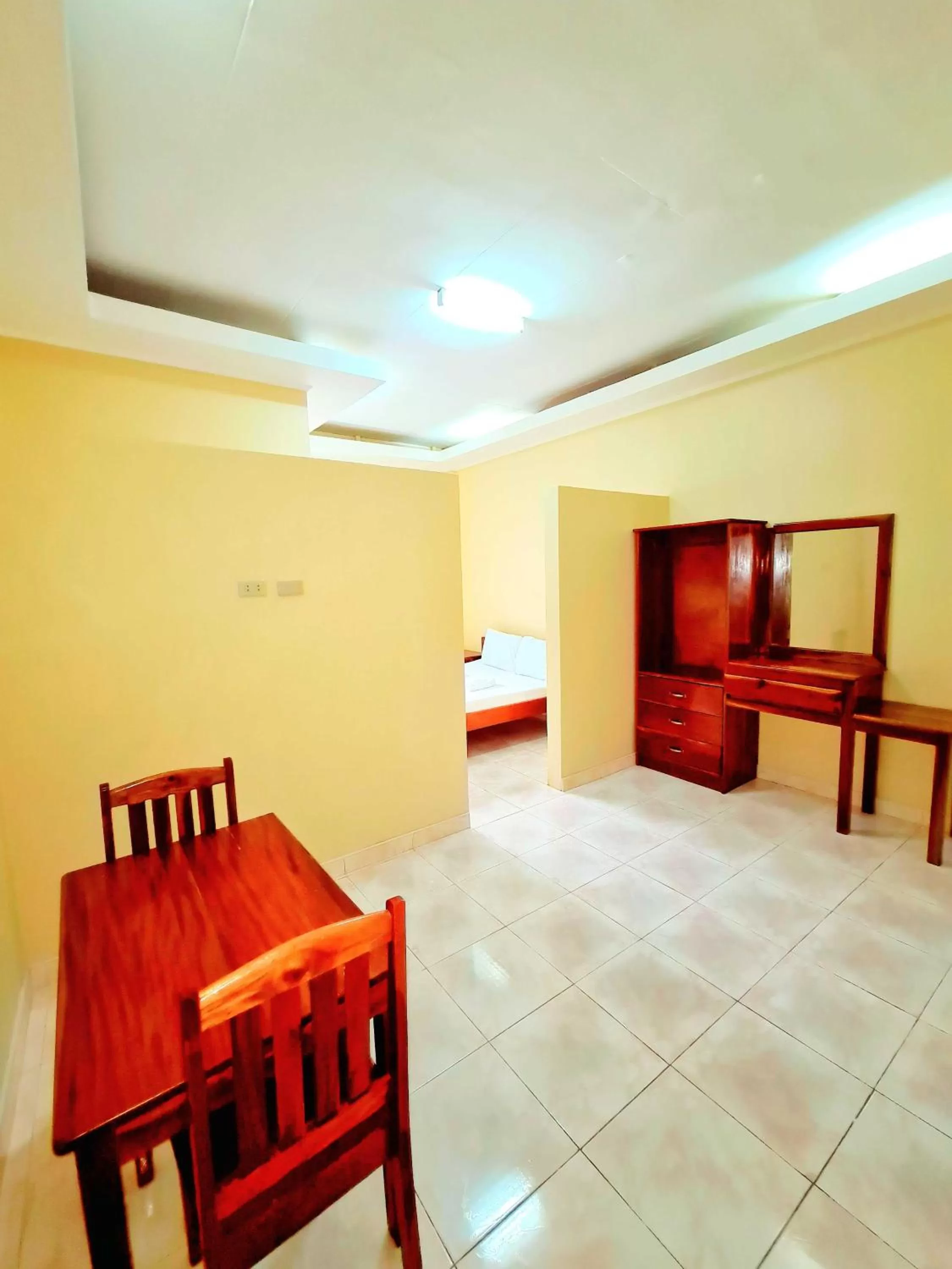 Bed in La-Familia Guest House