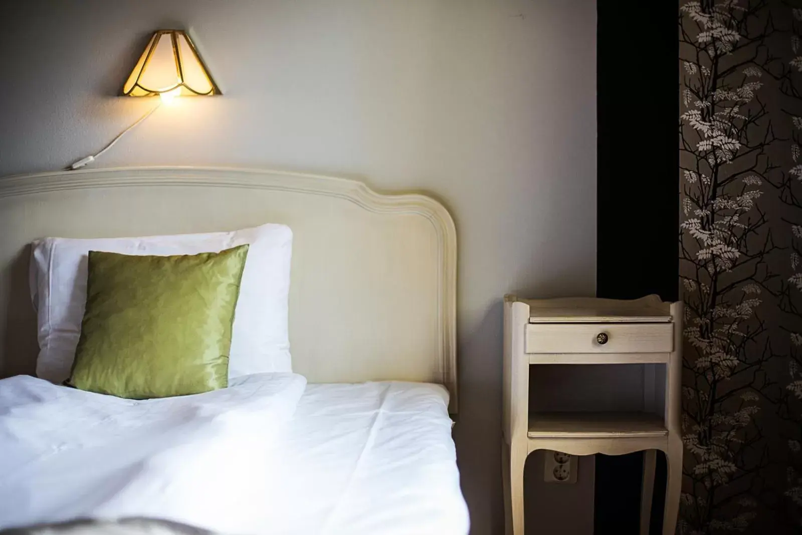 Bed in First Hotel Olofström