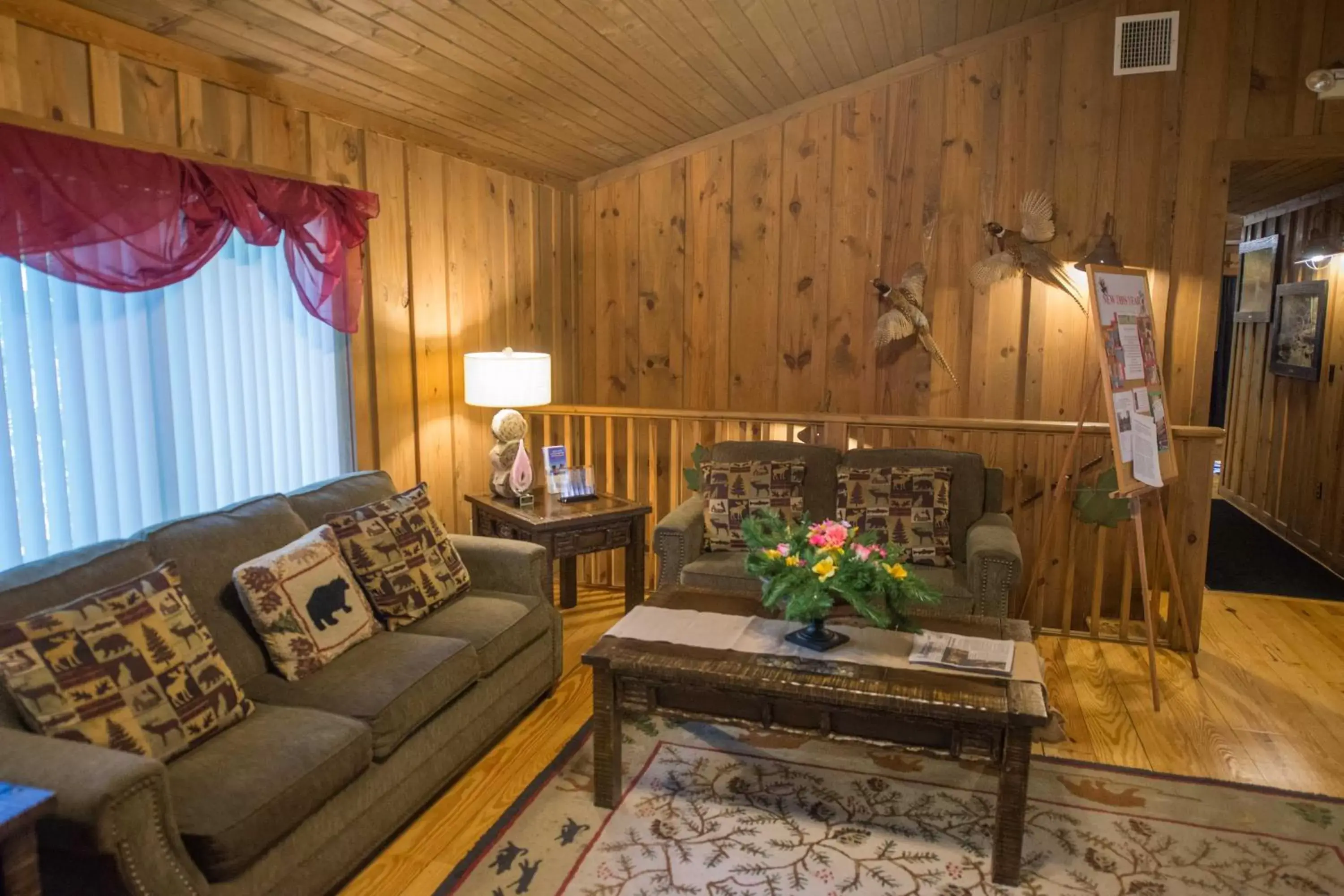 Communal lounge/ TV room, Seating Area in Cabins at Green Mountain, Trademark Collection by Wyndham