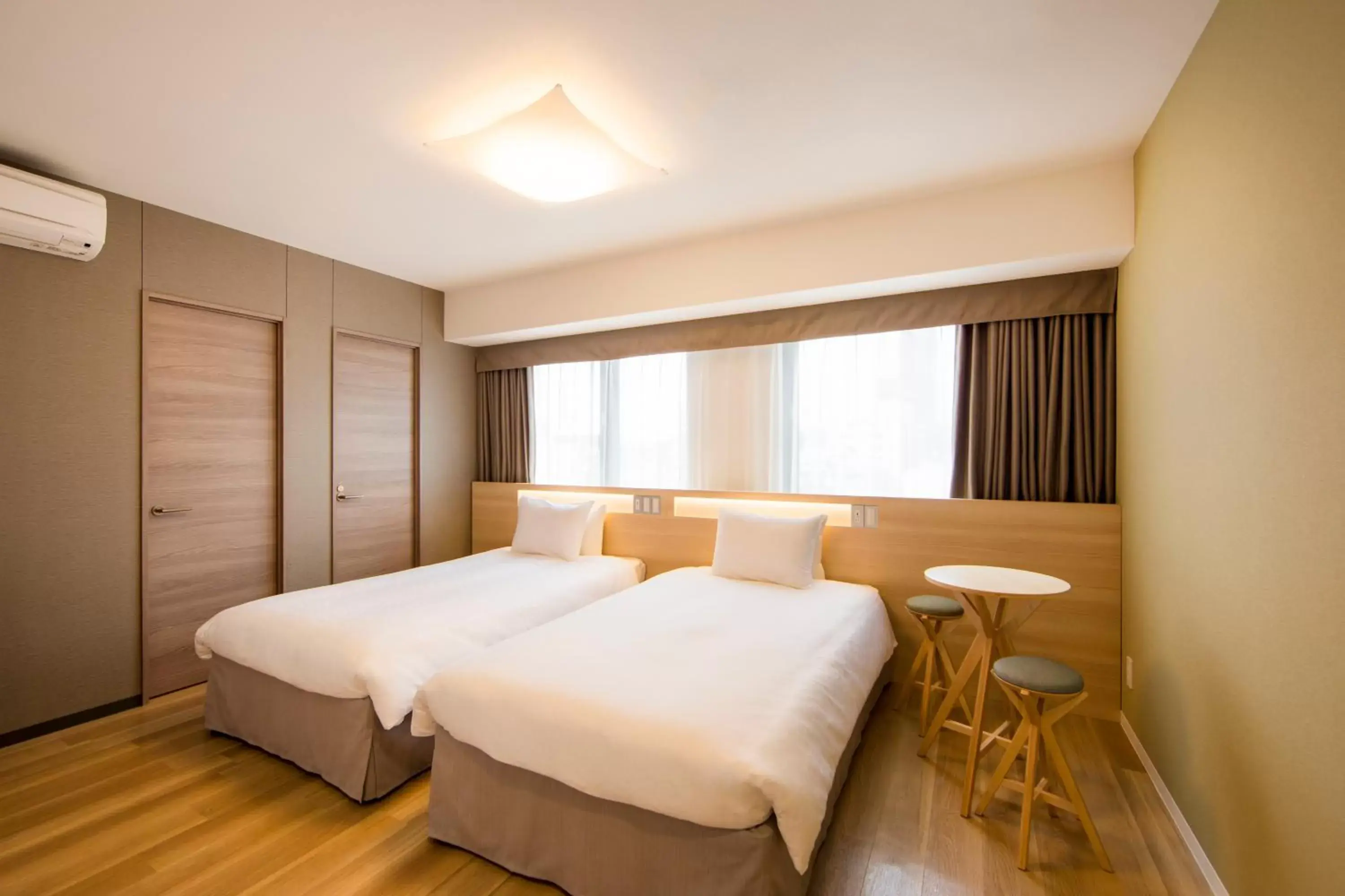 Bed in Karaksa Hotel Osaka Namba