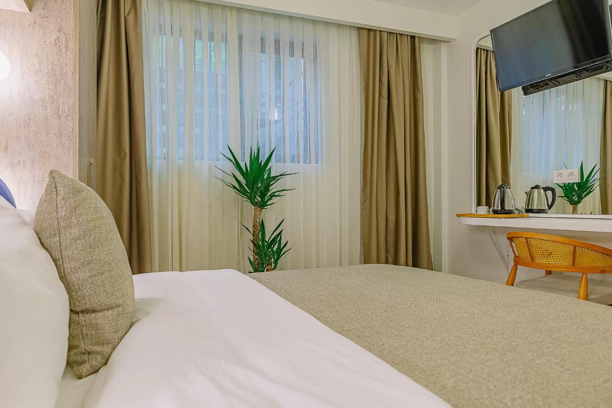 Bed in The Wilson Galata Hotel