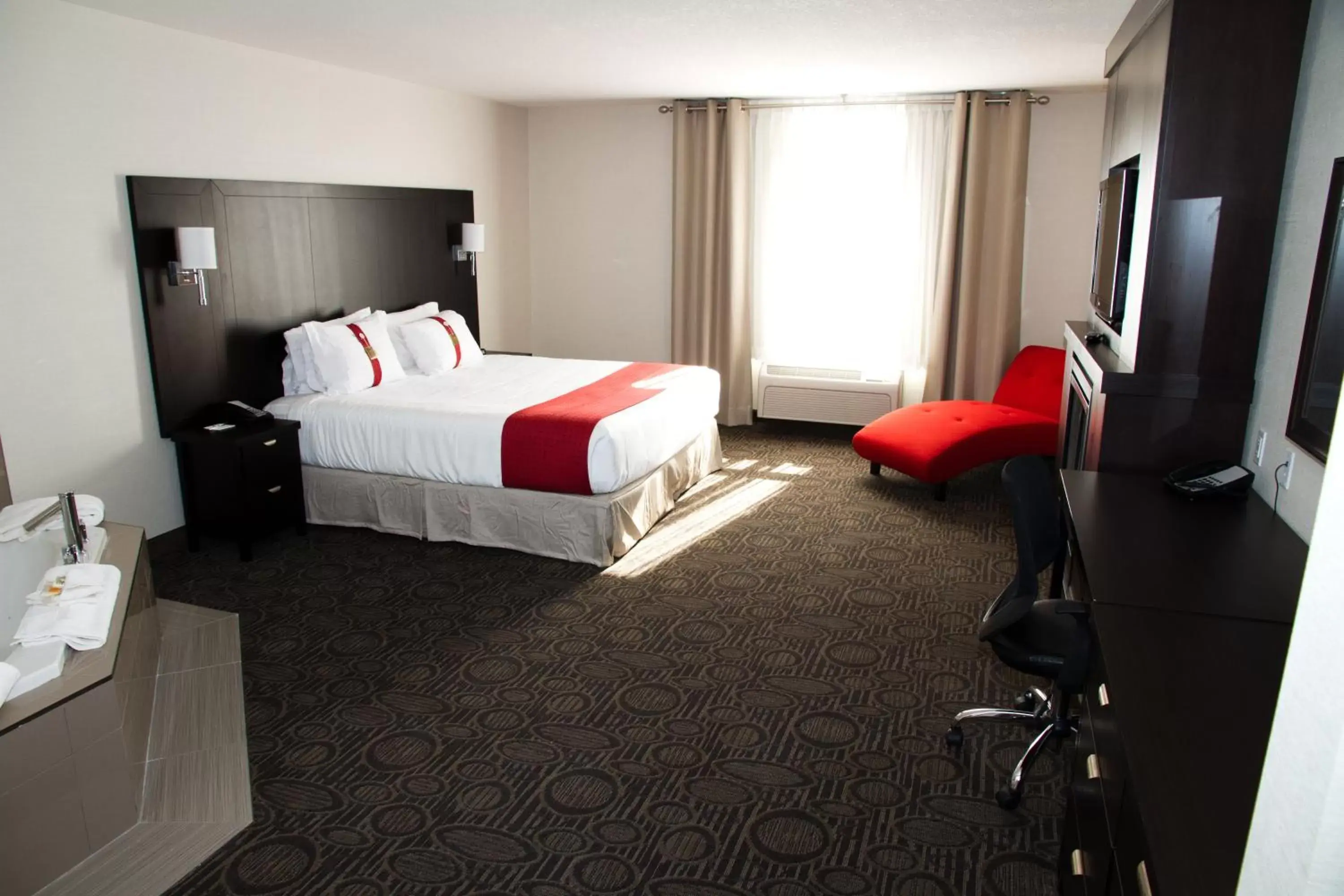 Photo of the whole room, Bed in Holiday Inn Hotel & Suites Red Deer, an IHG Hotel