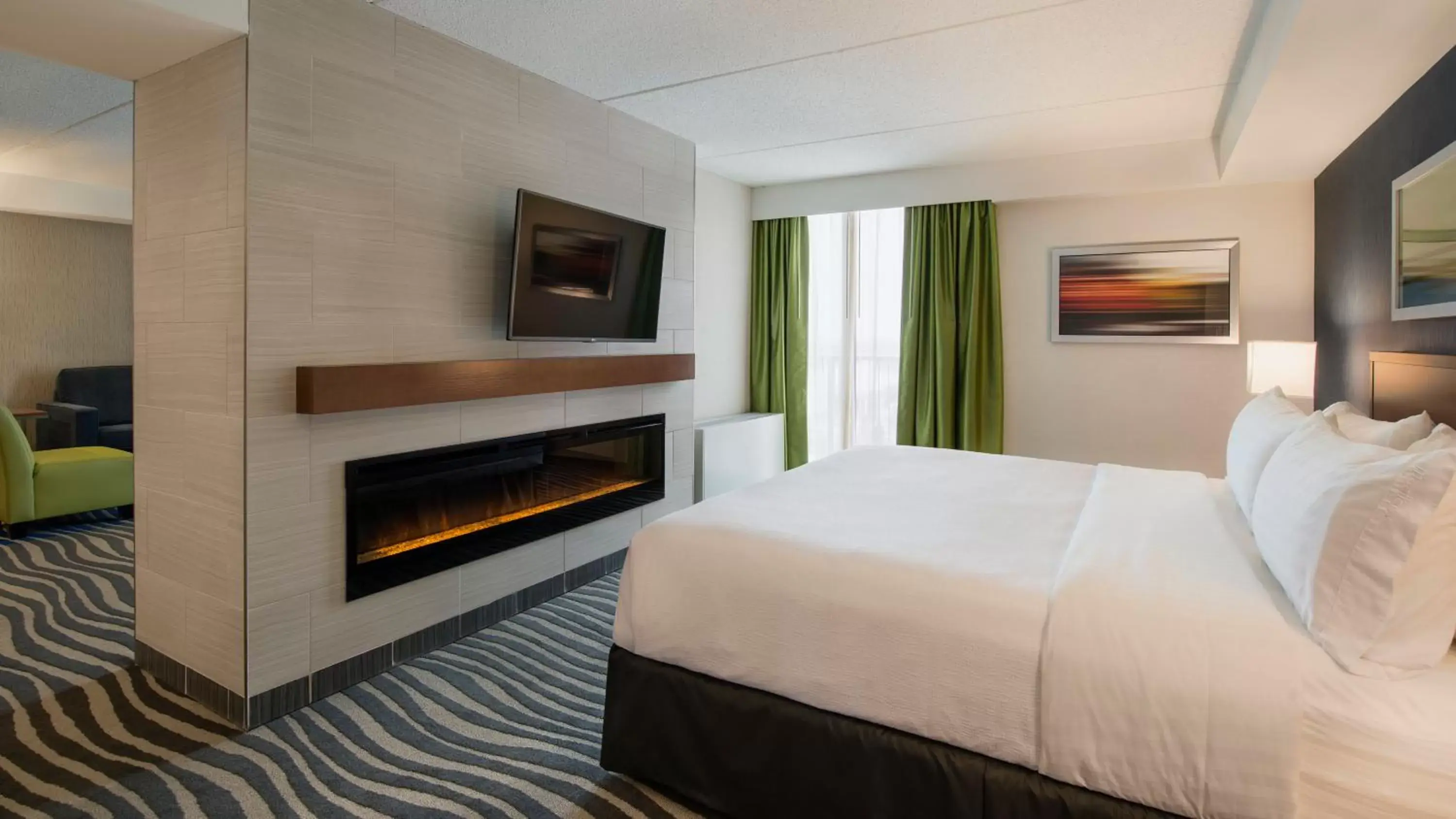 Photo of the whole room, TV/Entertainment Center in Holiday Inn Winnipeg - Airport West, an IHG Hotel