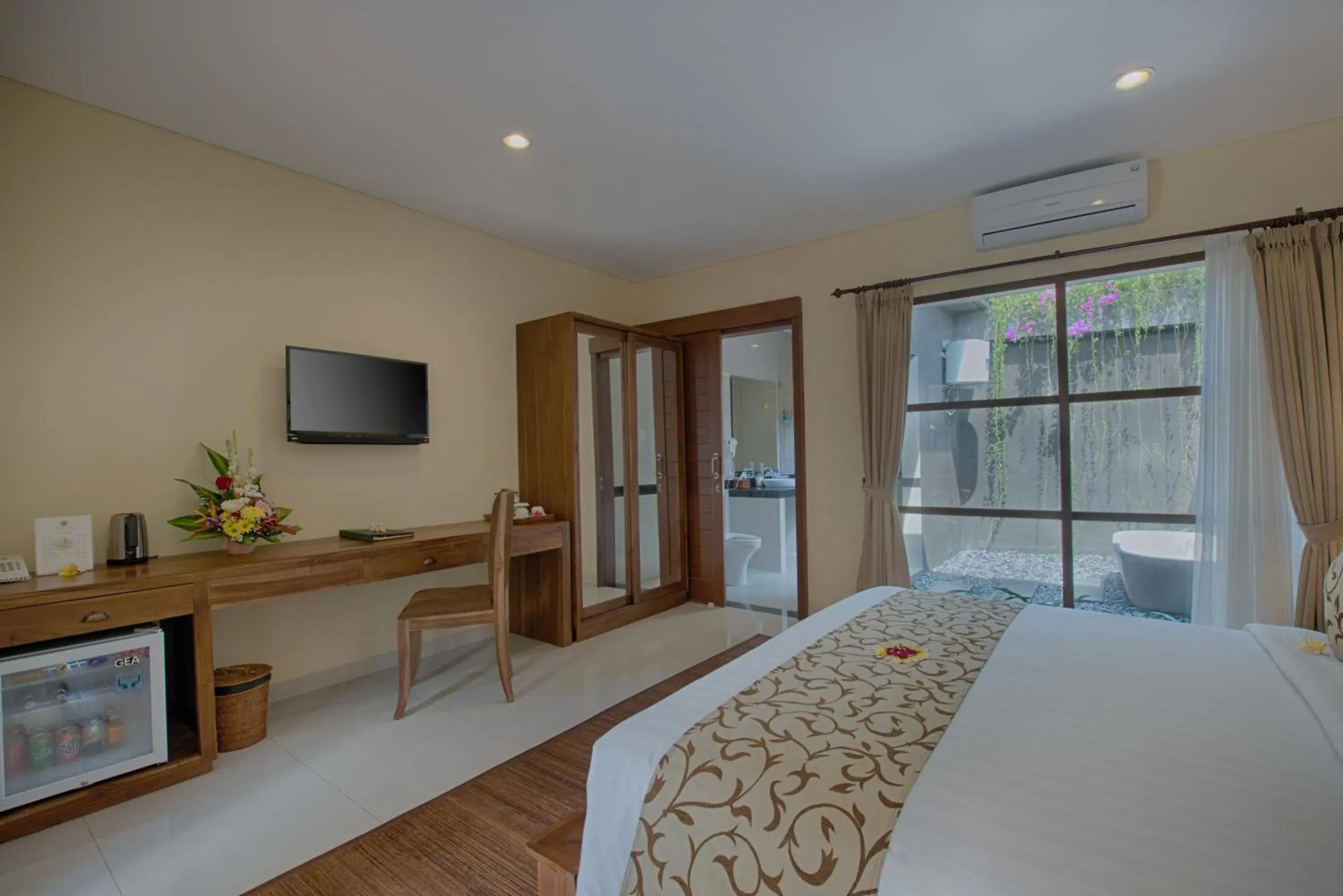 Photo of the whole room, TV/Entertainment Center in Kadiga Villas Ubud