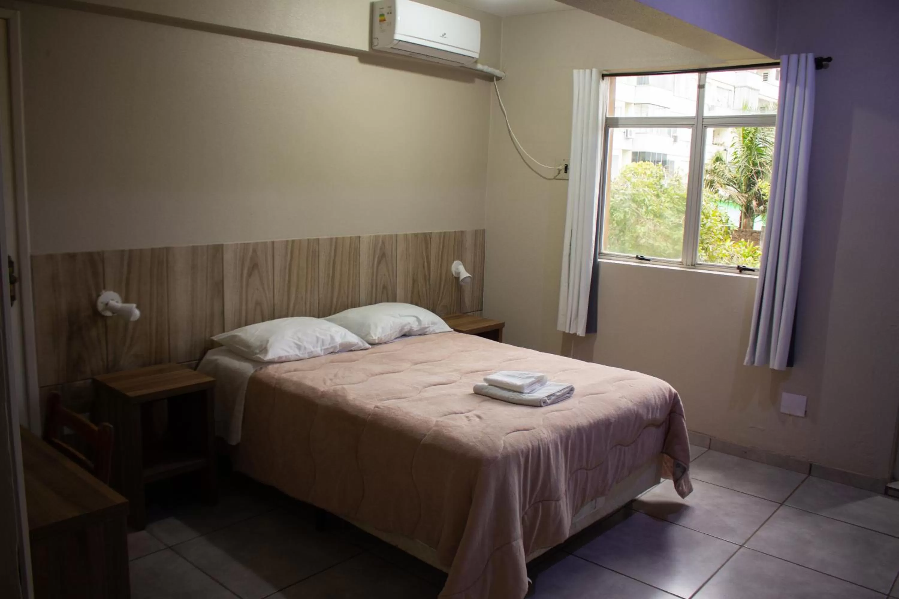 Bed in Hotel Executivo