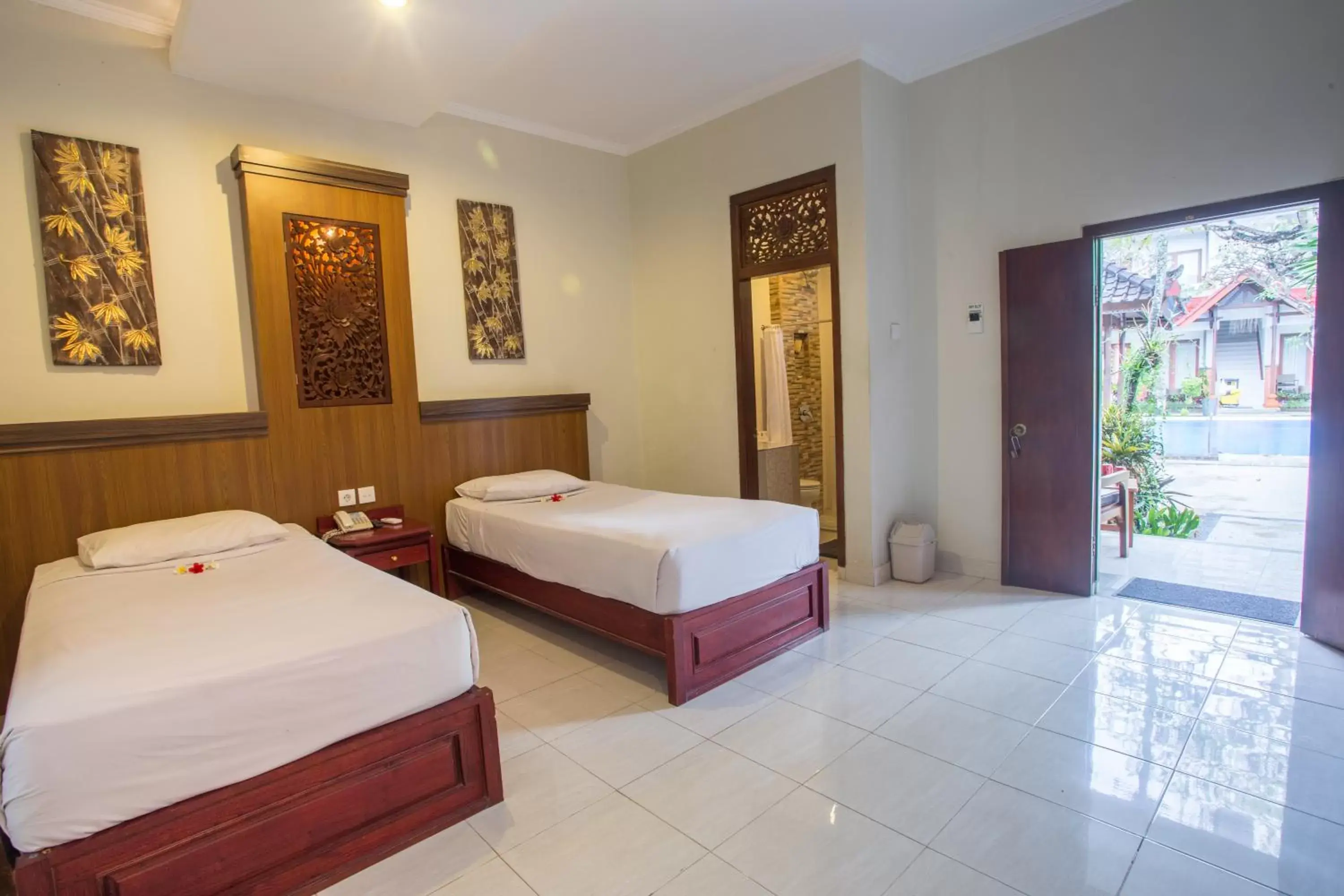 Bed in Sinar Bali Hotel