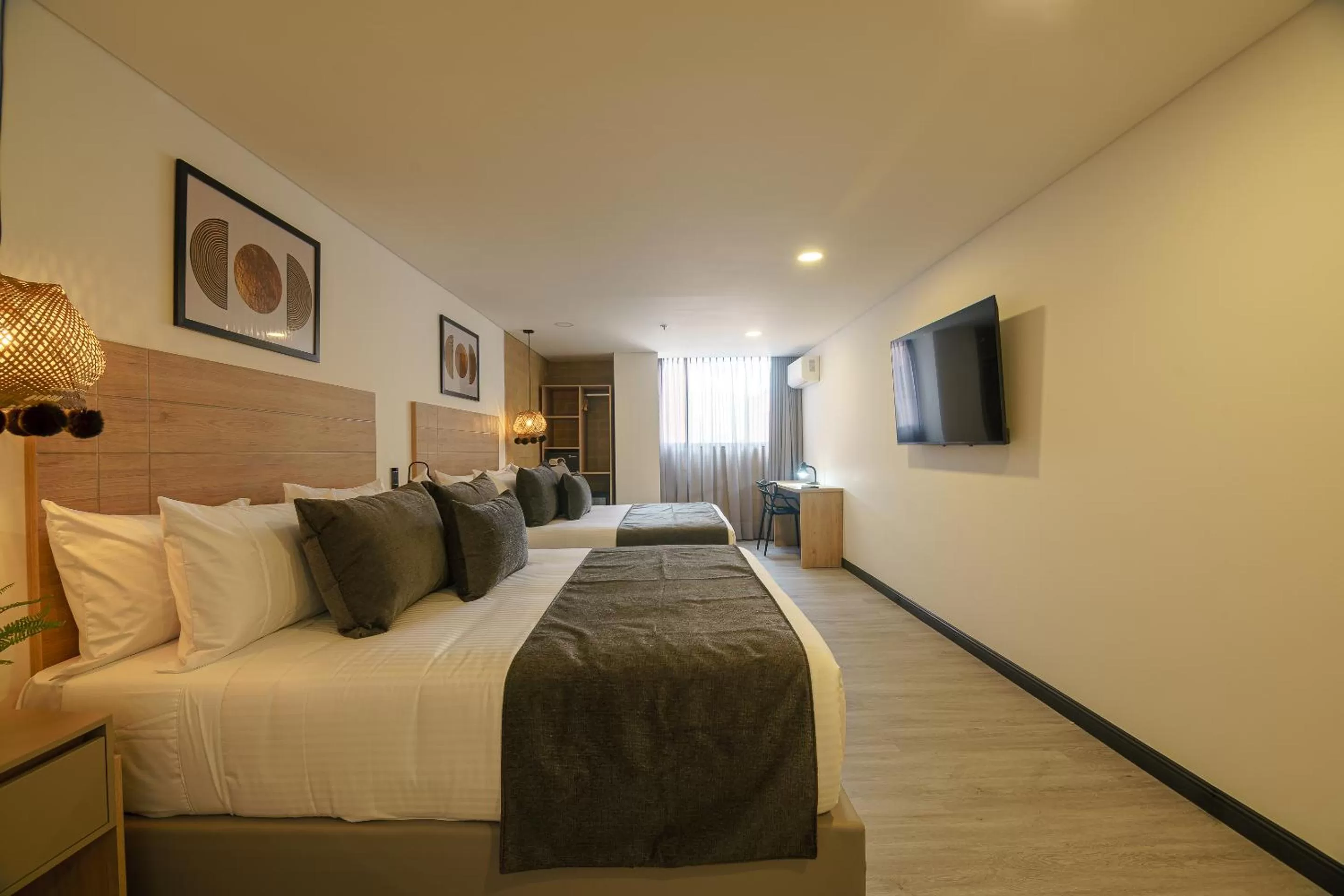 Photo of the whole room, Bed in First Class Hotel