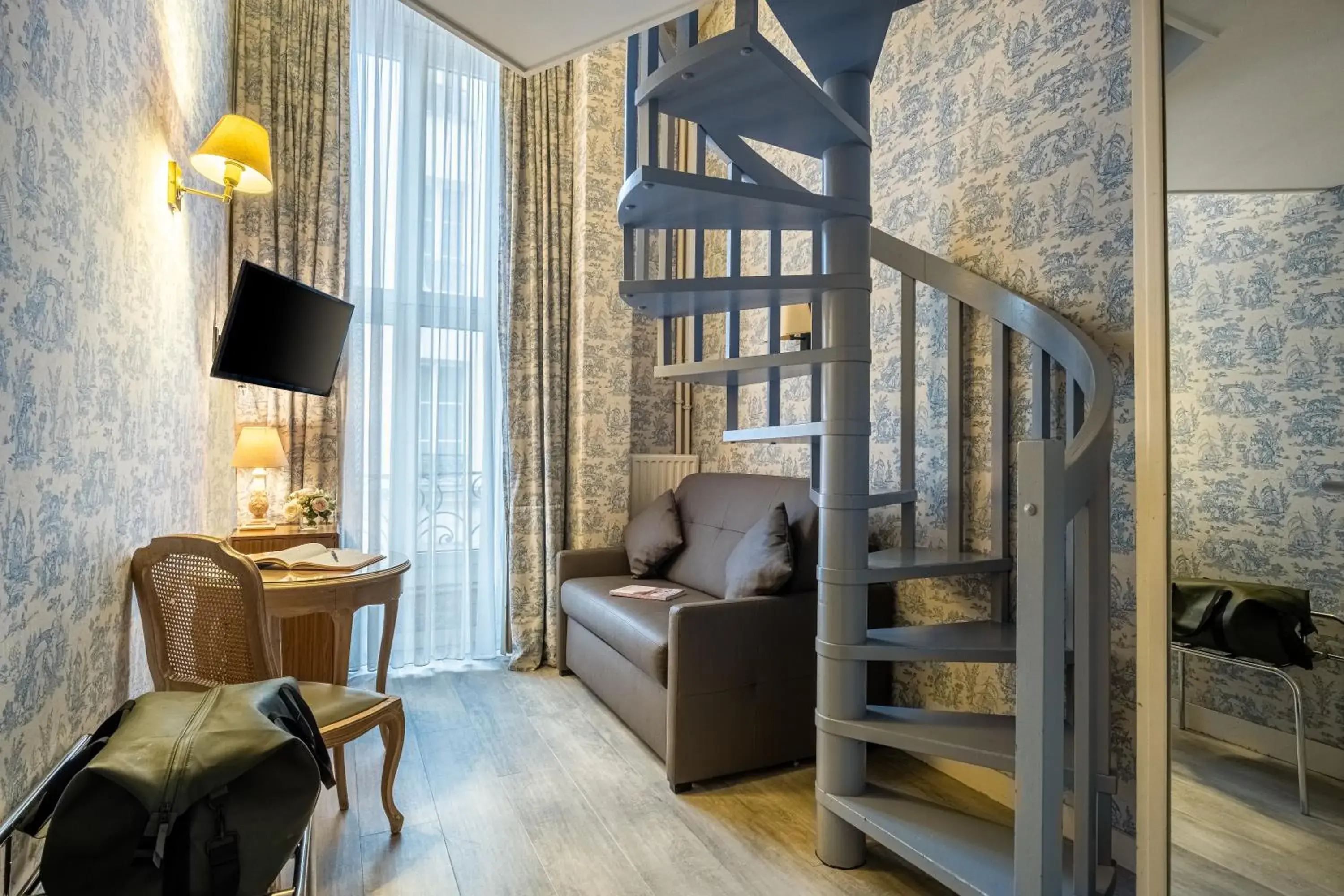 Bedroom, Seating Area in Hôtel Baudelaire Opéra