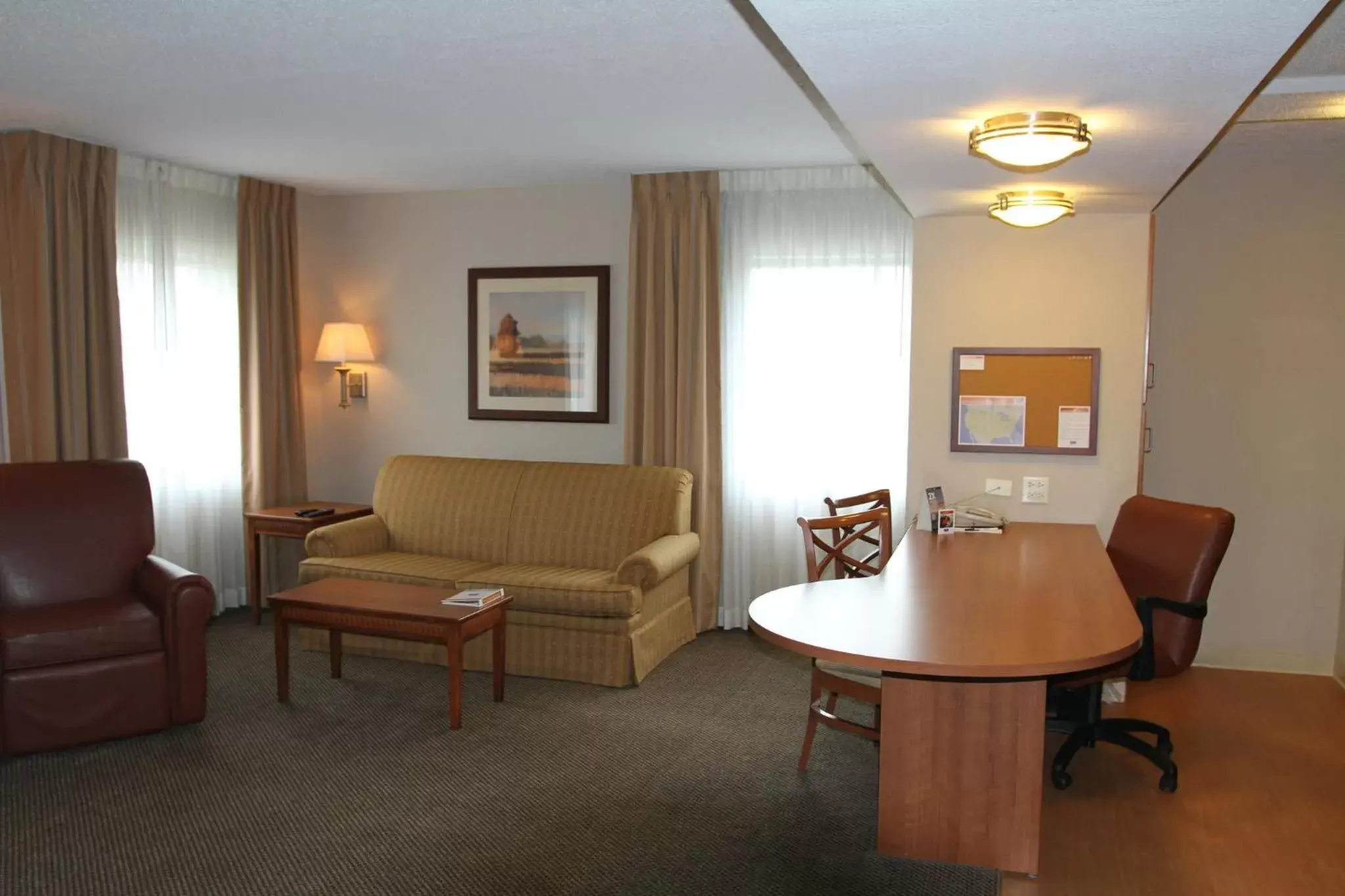 Bedroom, Seating Area in Candlewood Suites Indianapolis Downtown Medical District, an IHG Hotel