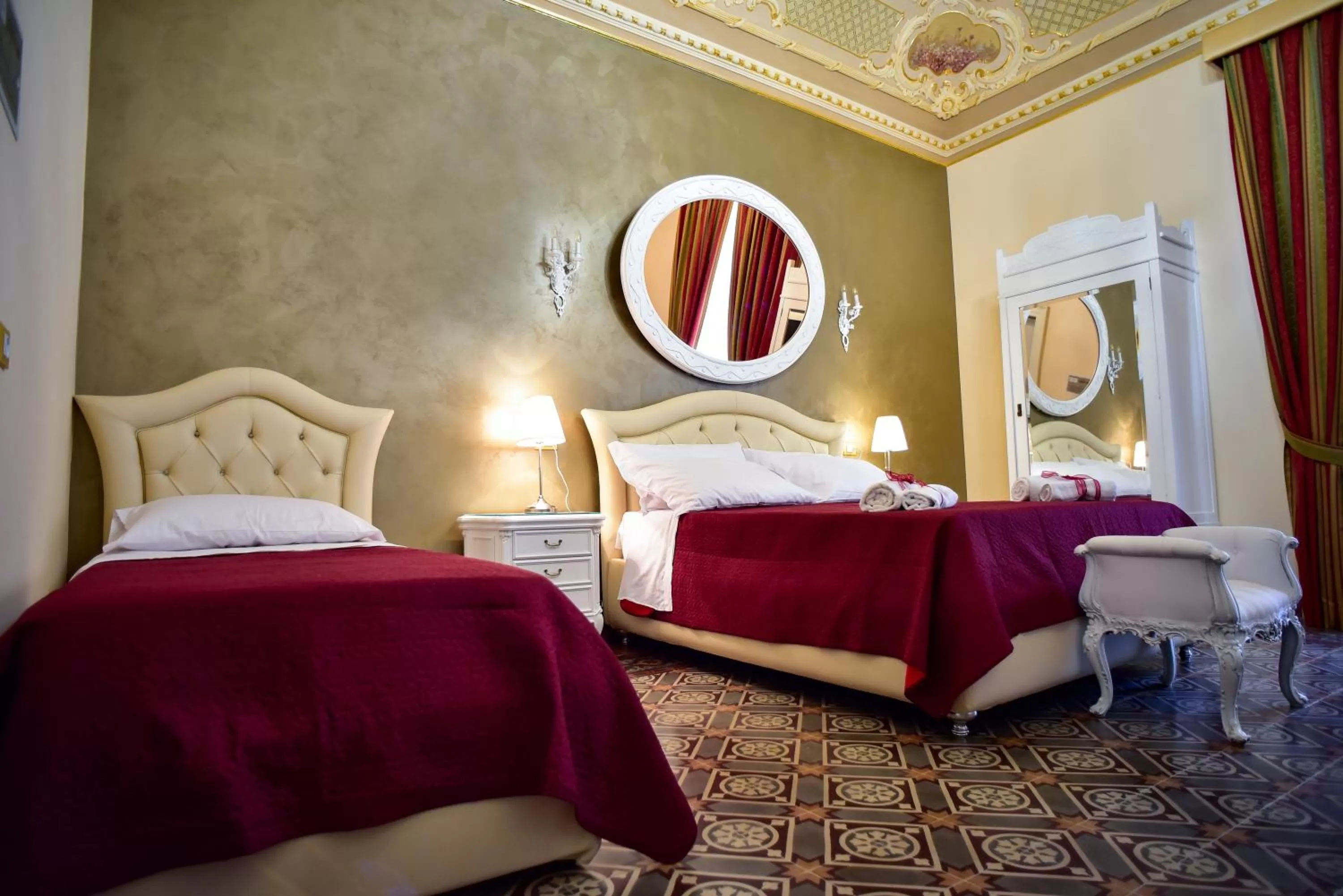Photo of the whole room, Bed in Palazzo degli Affreschi