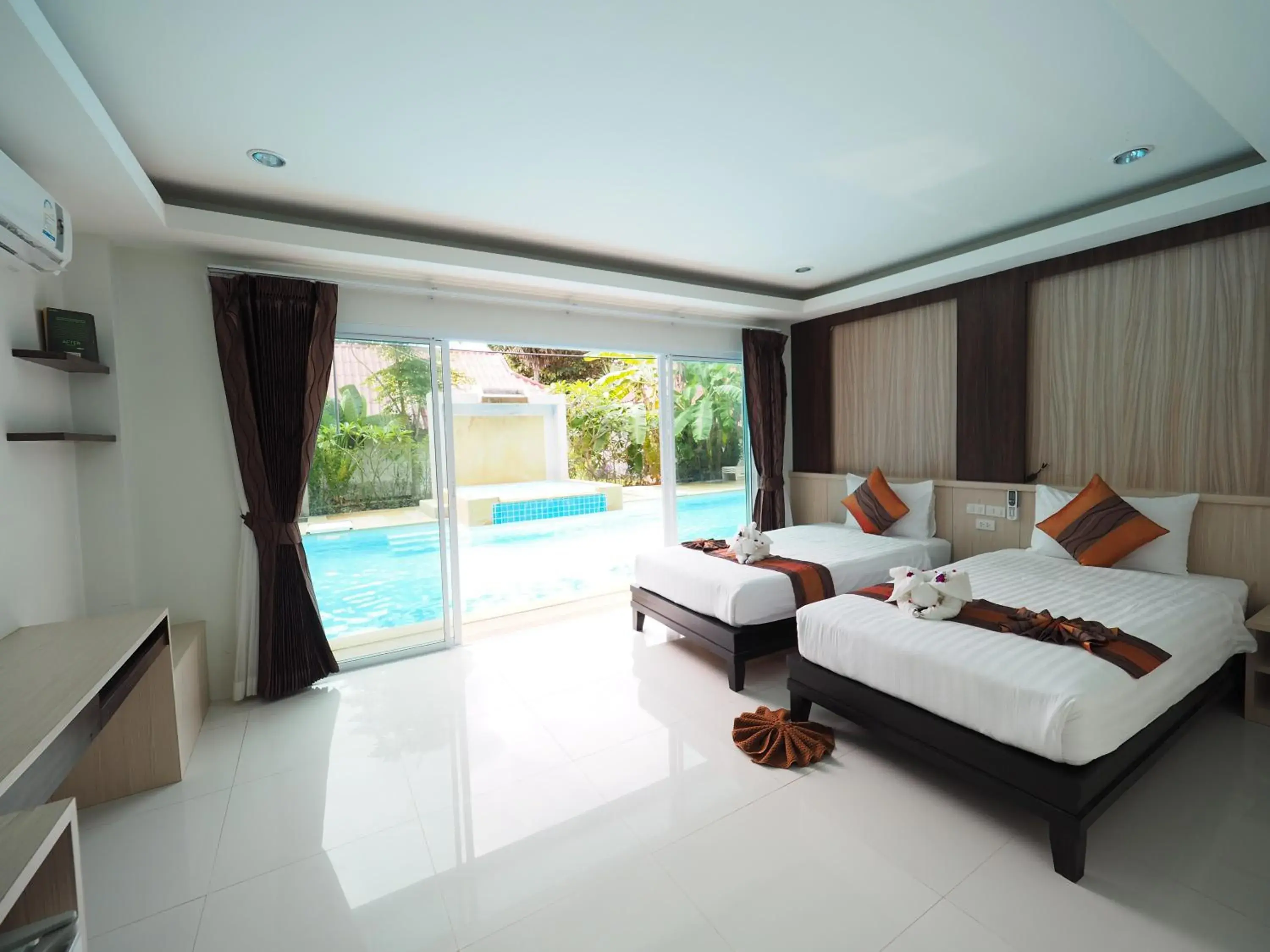Bed, Pool View in Lanta Fevrier Resort