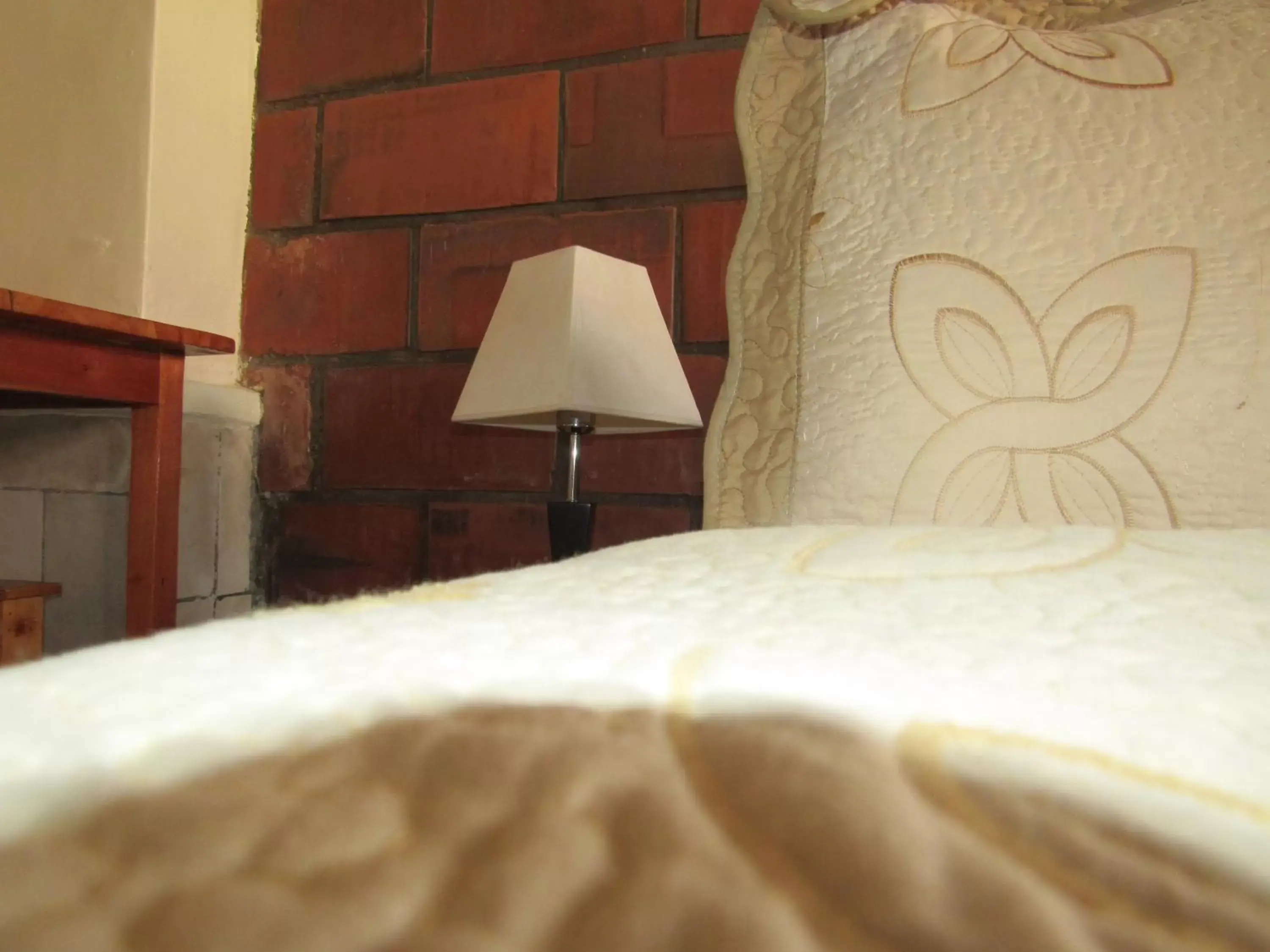 Bed in Rebero Kivu Resort Bed in Rebero Kivu Resort