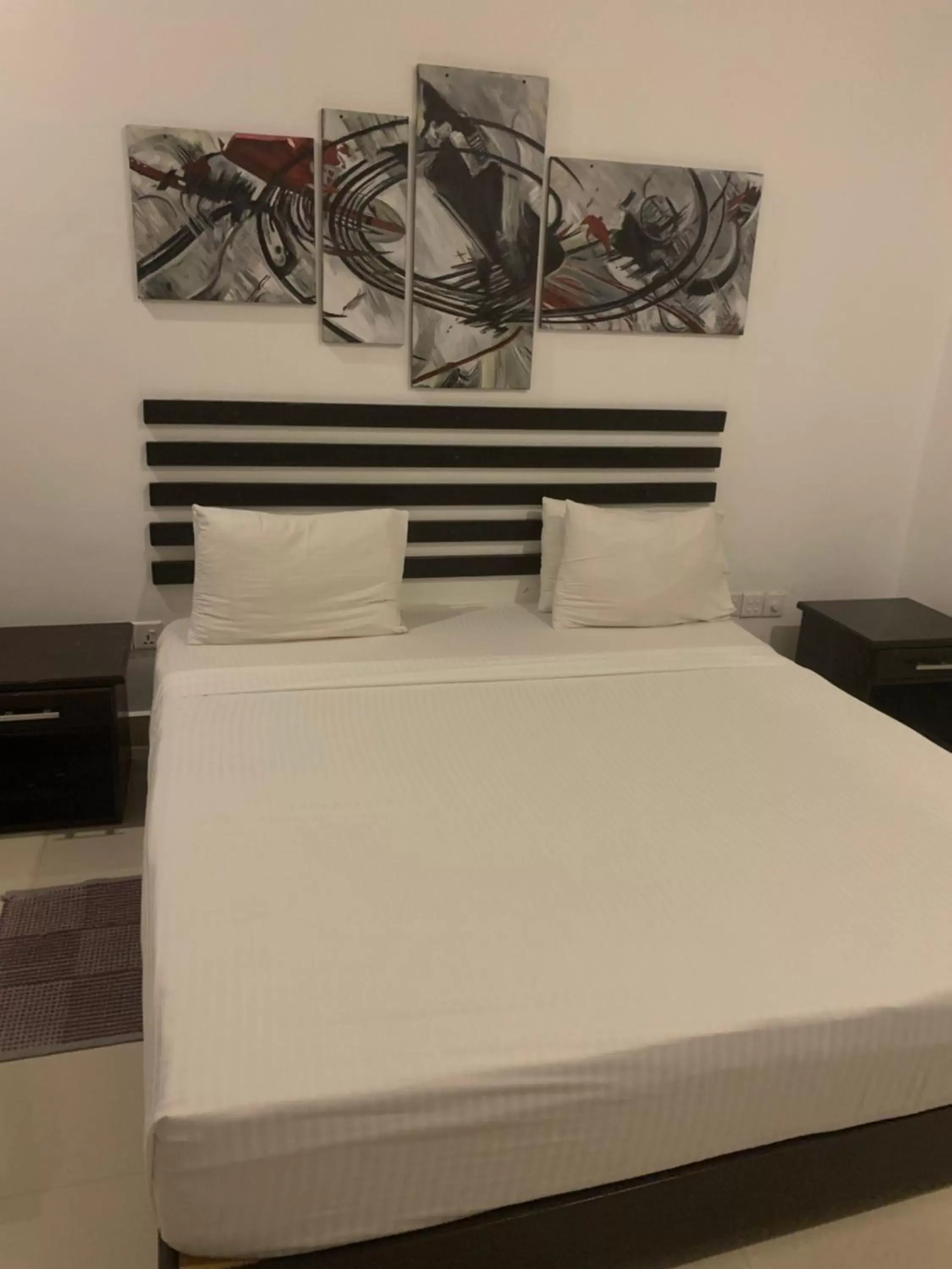 Bed in Sunrise Palace Negombo Bed in Sunrise Palace Negombo