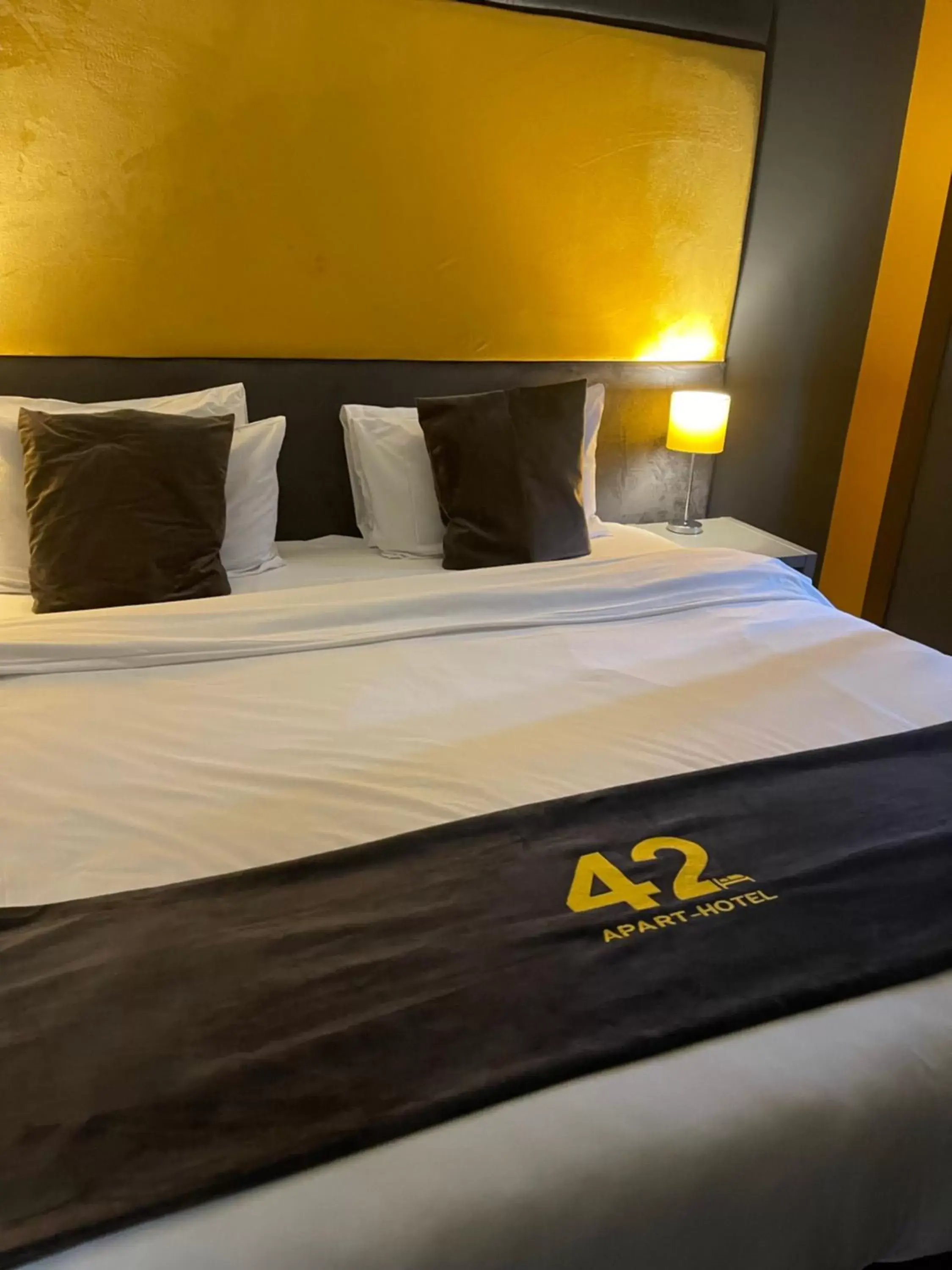 Bed in 42 Apart-Hotel