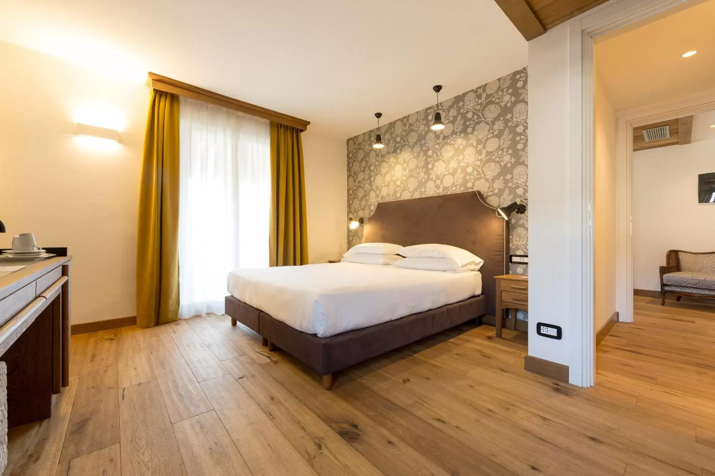 Bedroom in Duca D'Aosta Hotel