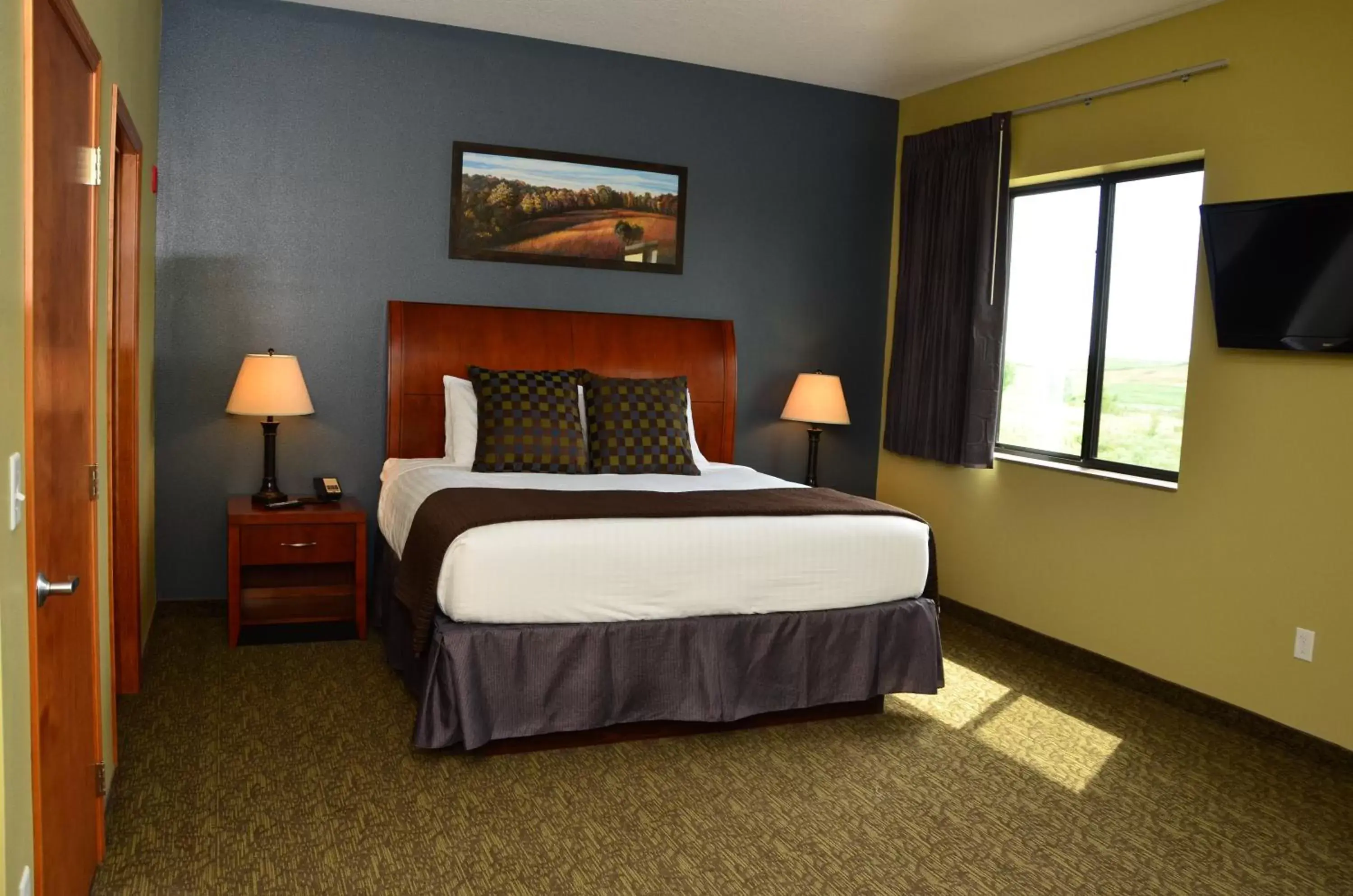 Bed in Cobblestone Inn & Suites - Newton