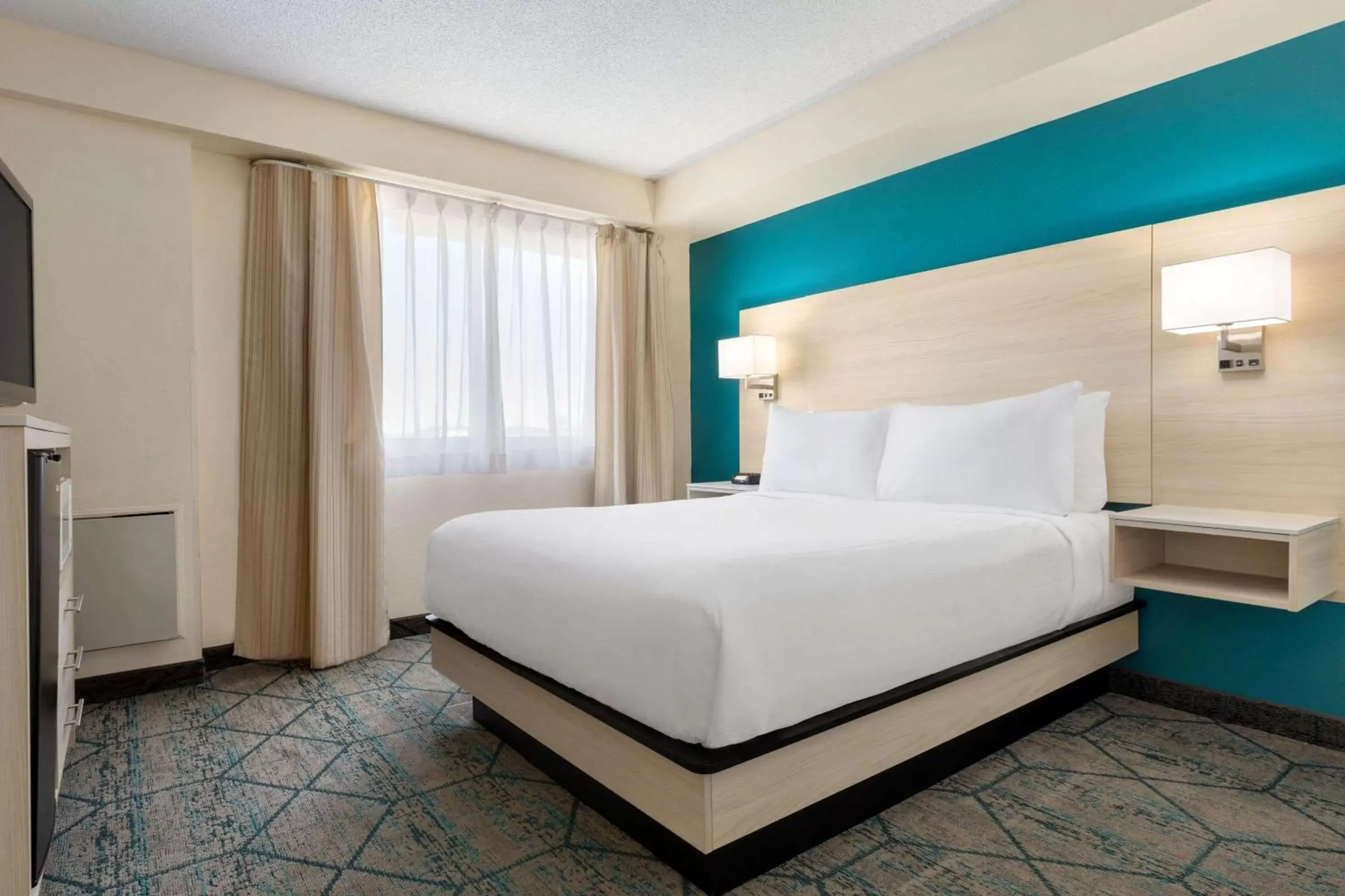 Photo of the whole room, Bed in Ramada by Wyndham Miramichi New Brunswick