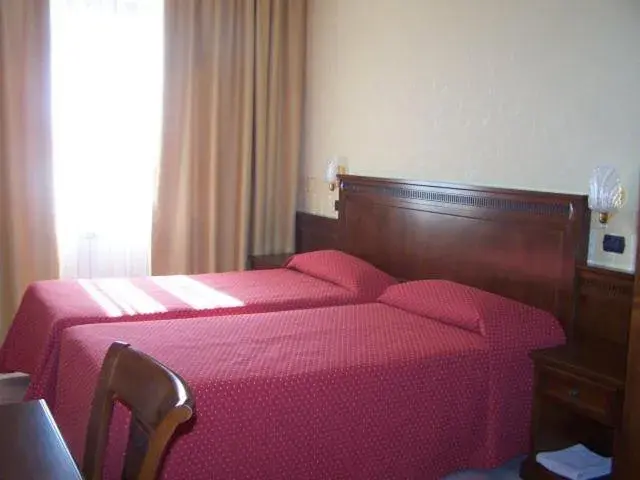 Bed in Hotel Ai Sette Nani