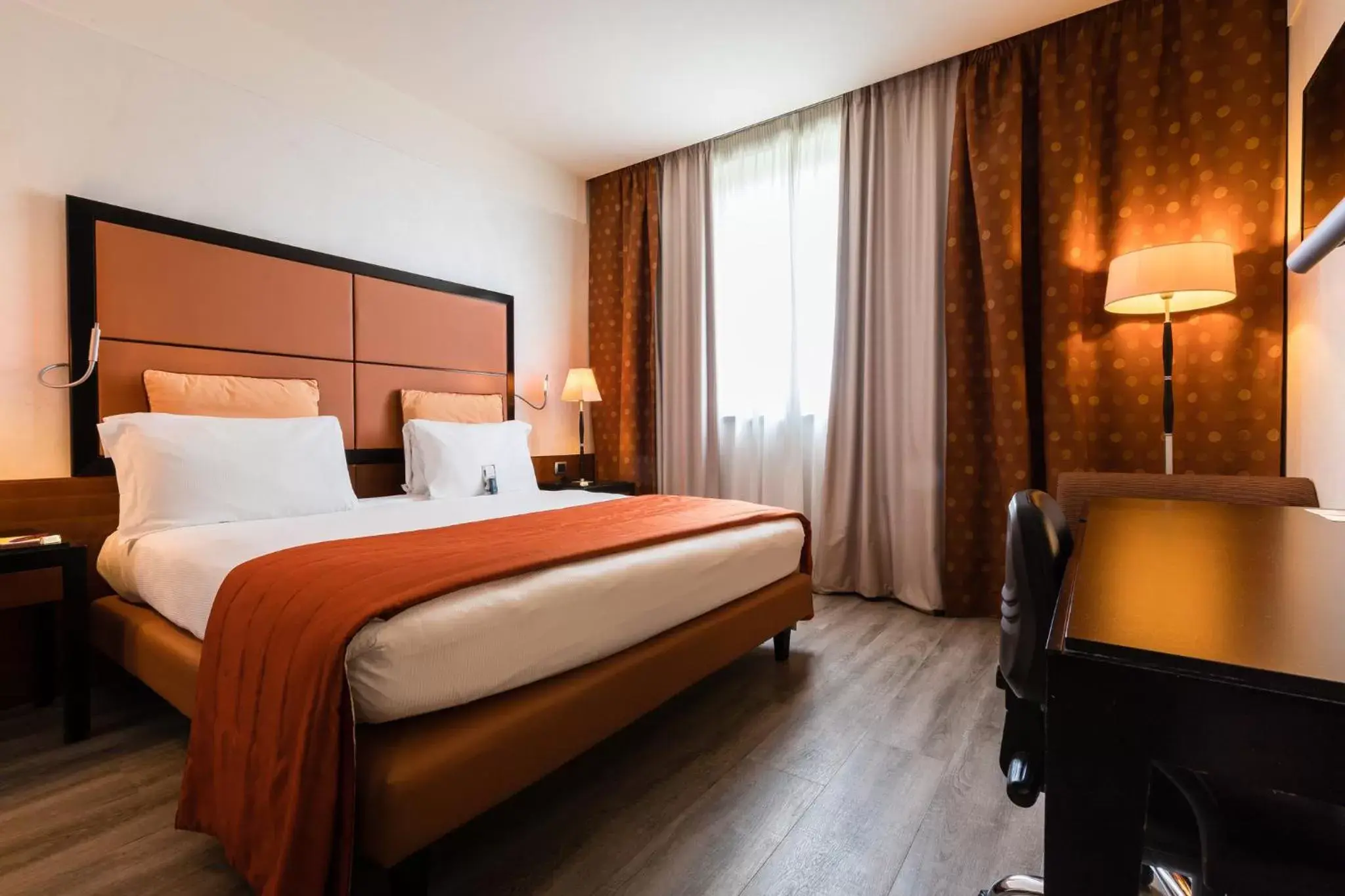 Photo of the whole room, Bed in Crowne Plaza Milan Malpensa Airport, an IHG Hotel