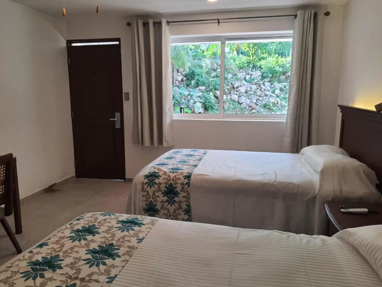 Photo of the whole room, Bed in Hotel Puerta Chichen