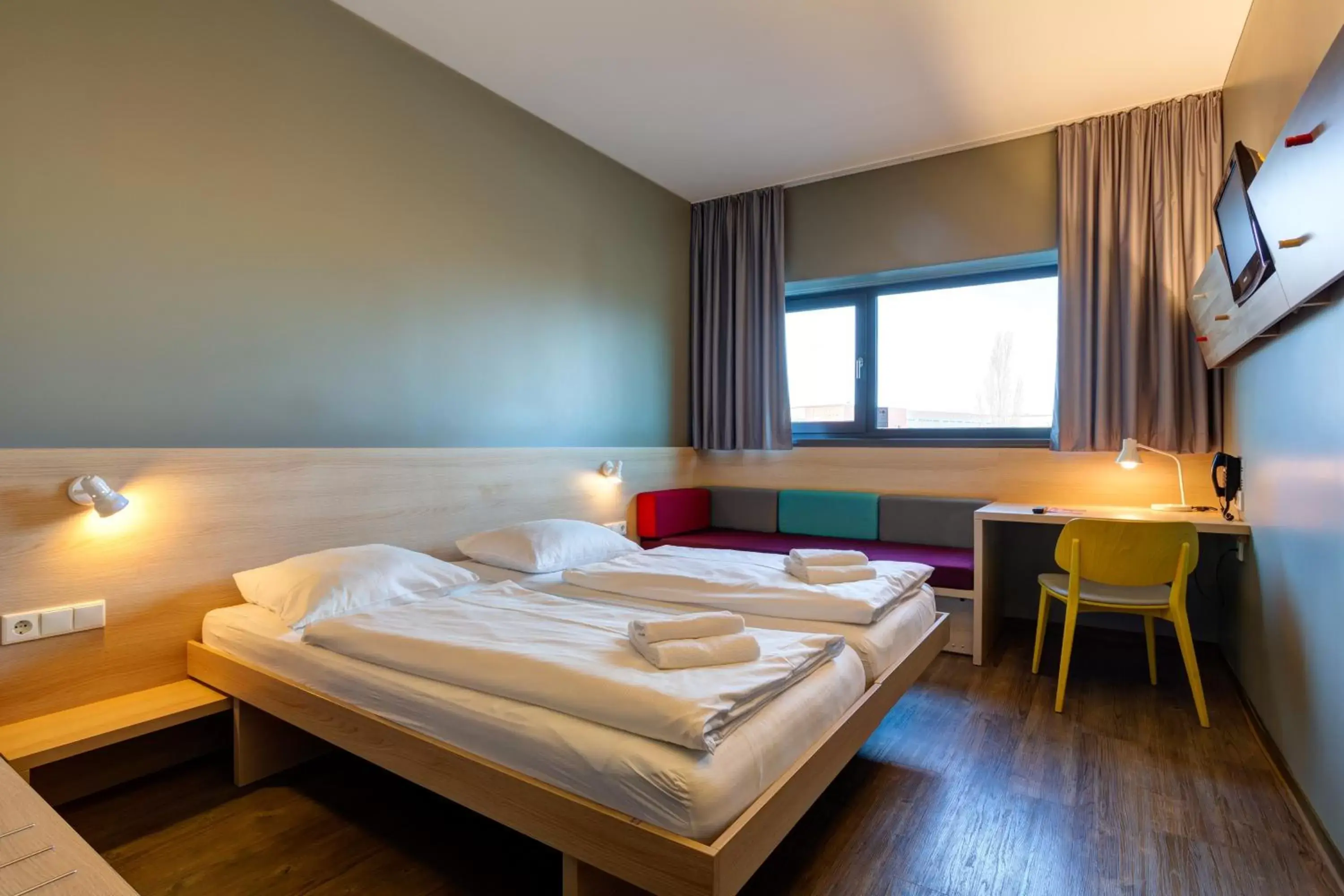 Photo of the whole room, Bed in MEININGER Hotel Berlin Airport